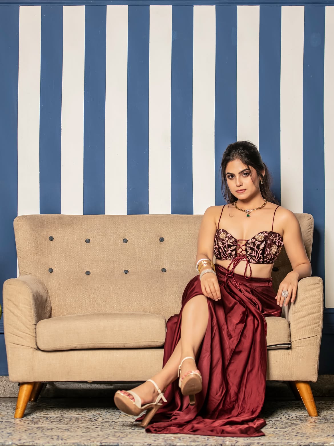 Naina Ganguly Striking A Poised Floor Seated Pose