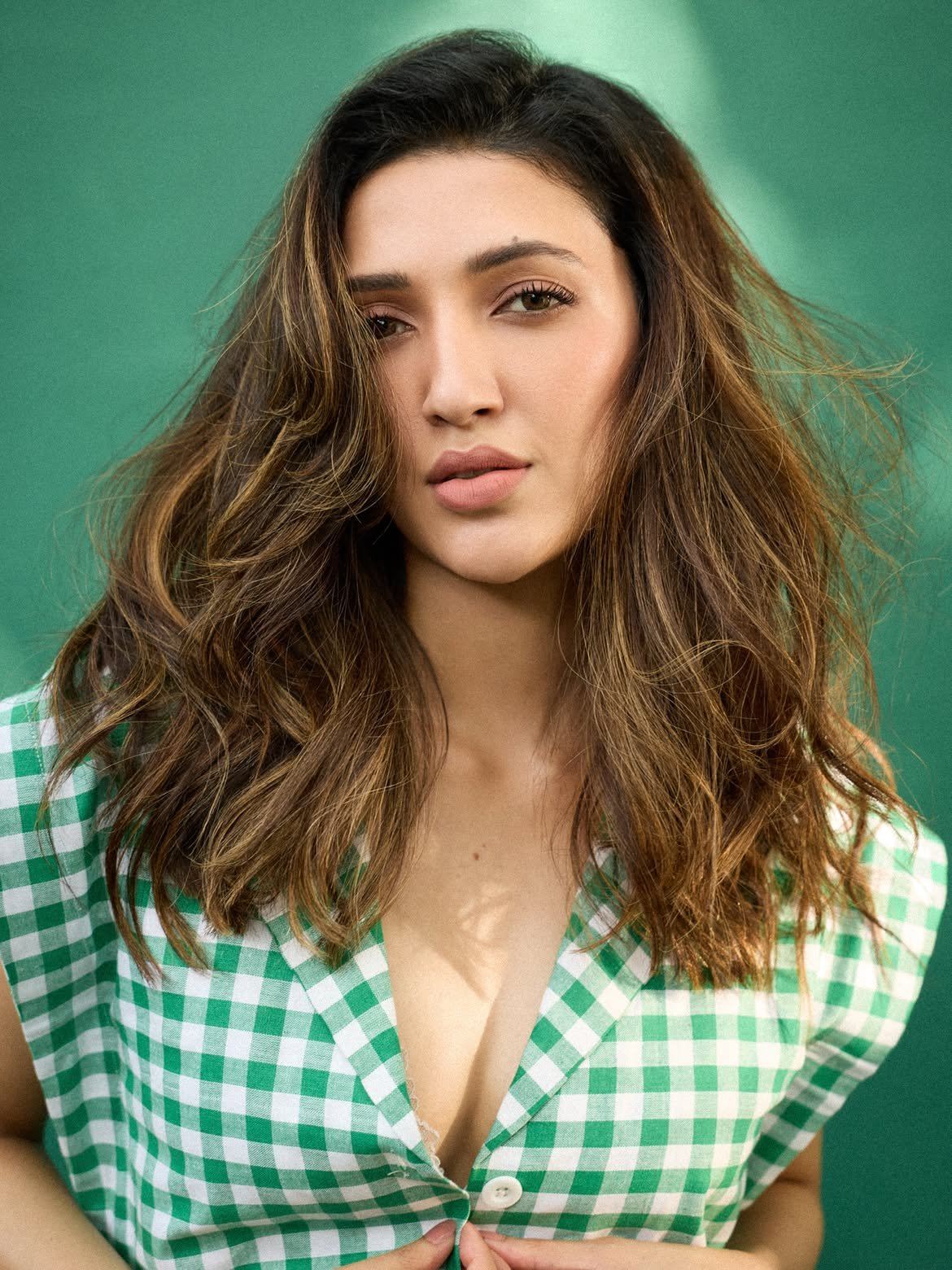Neha Shetty Direct Gaze In Tousled Hair Look
