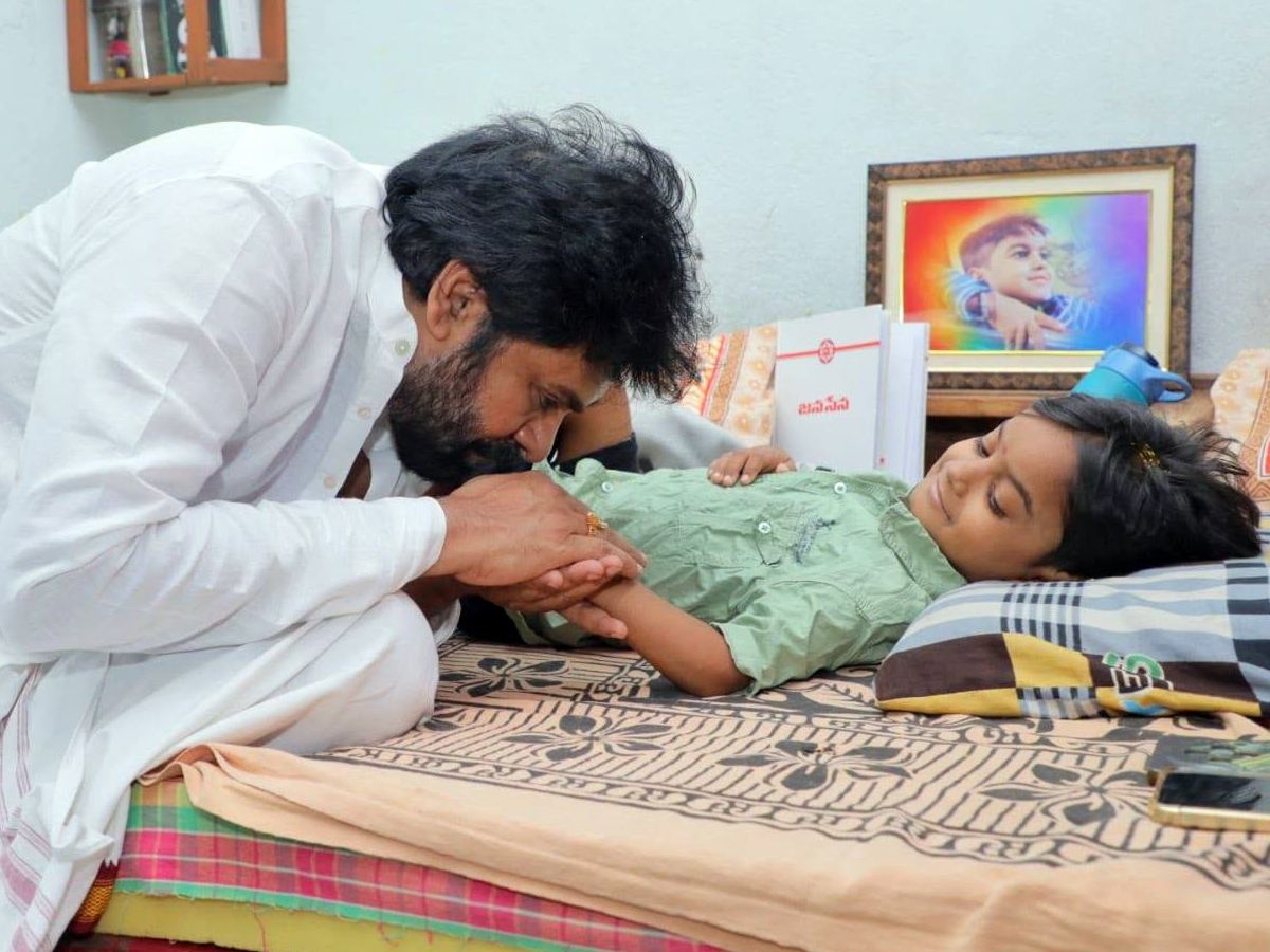 Pawan Kalyan with his fan Ponuganti Niranjan during their emotional meeting