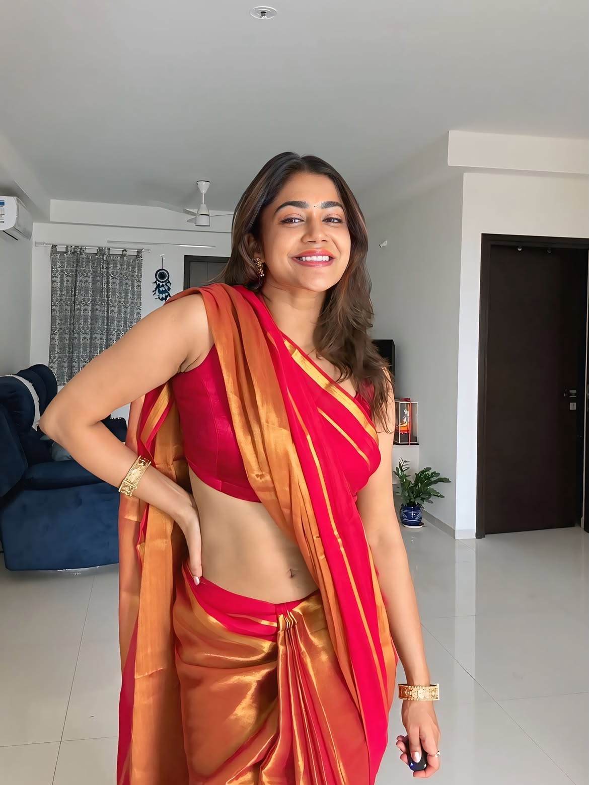 Payal Radhakrishna Displaying Ornate Gold Bangles Look