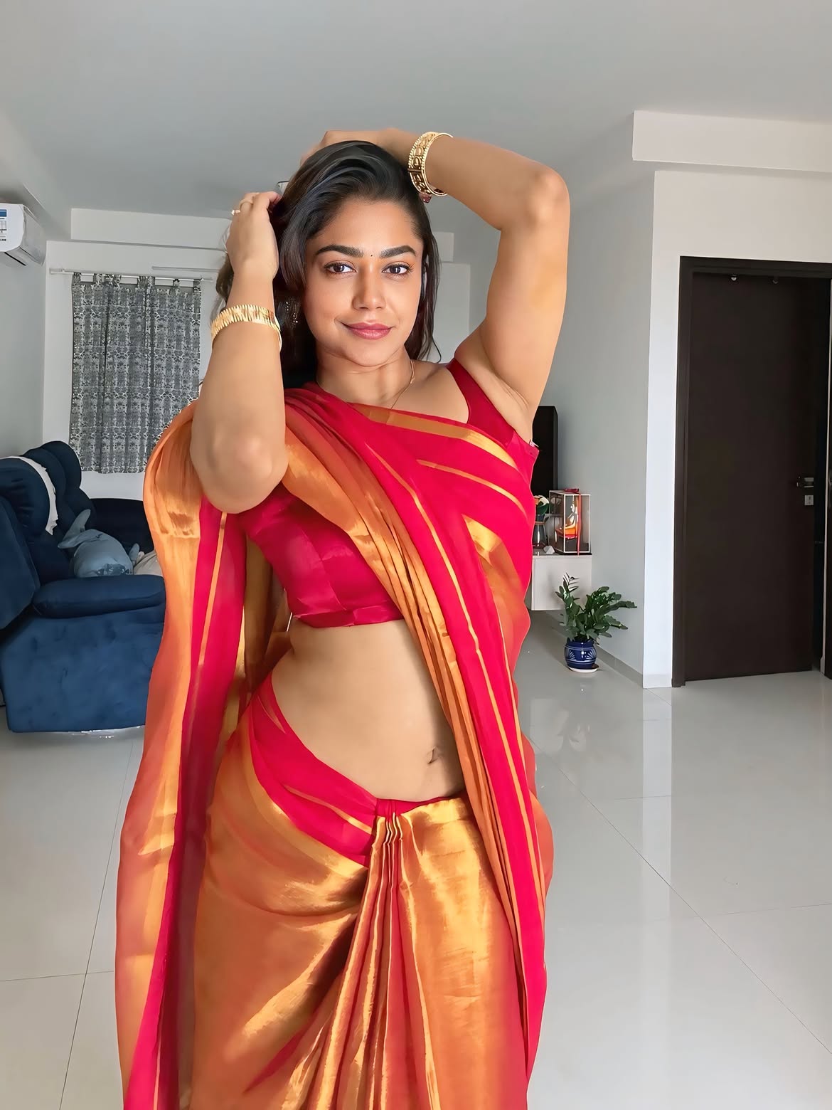 Payal Radhakrishna Showcasing Her Sleek Midriff Pose