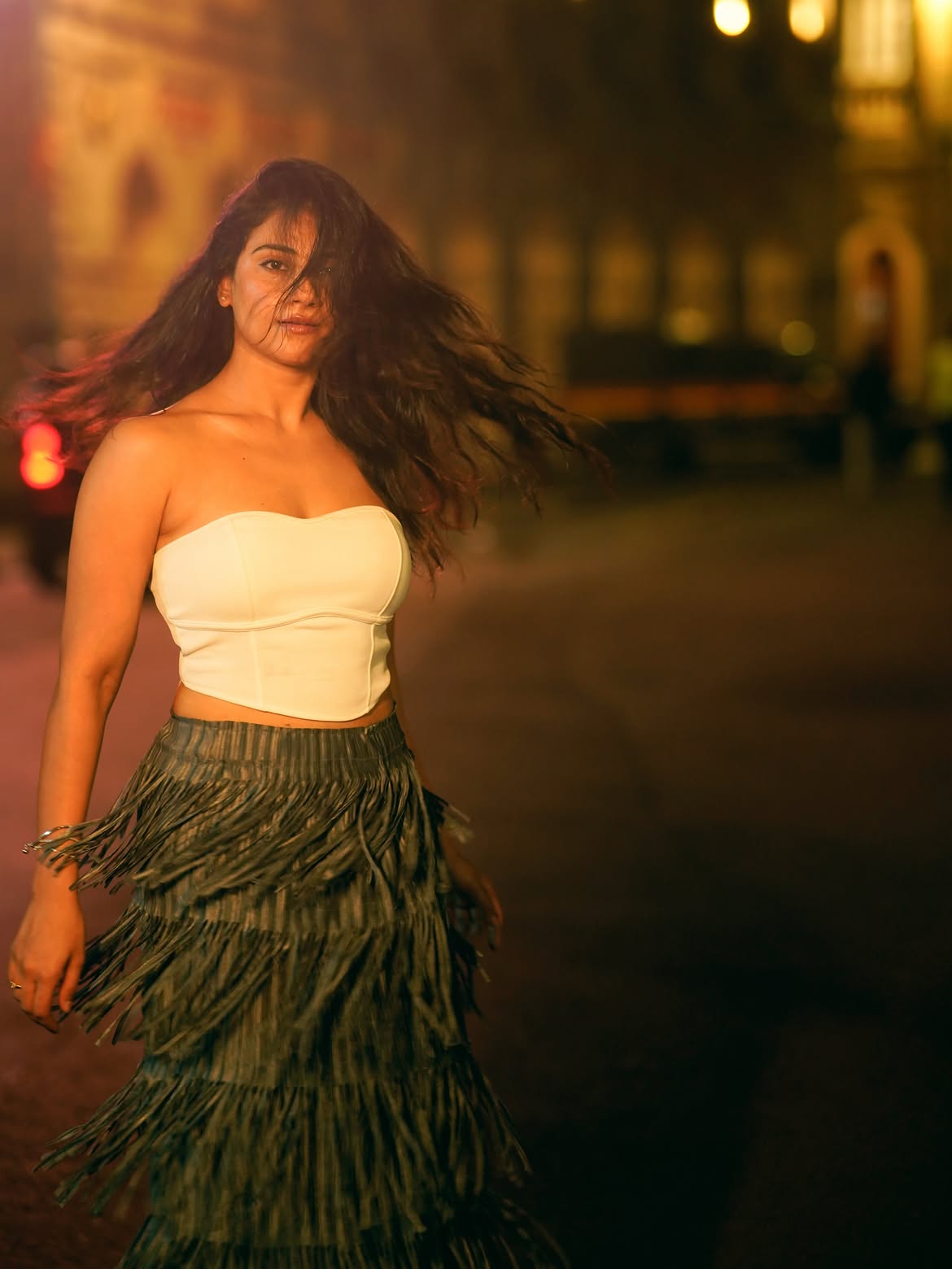 Prisha Singh Leaning Into Warm Night City Bokeh