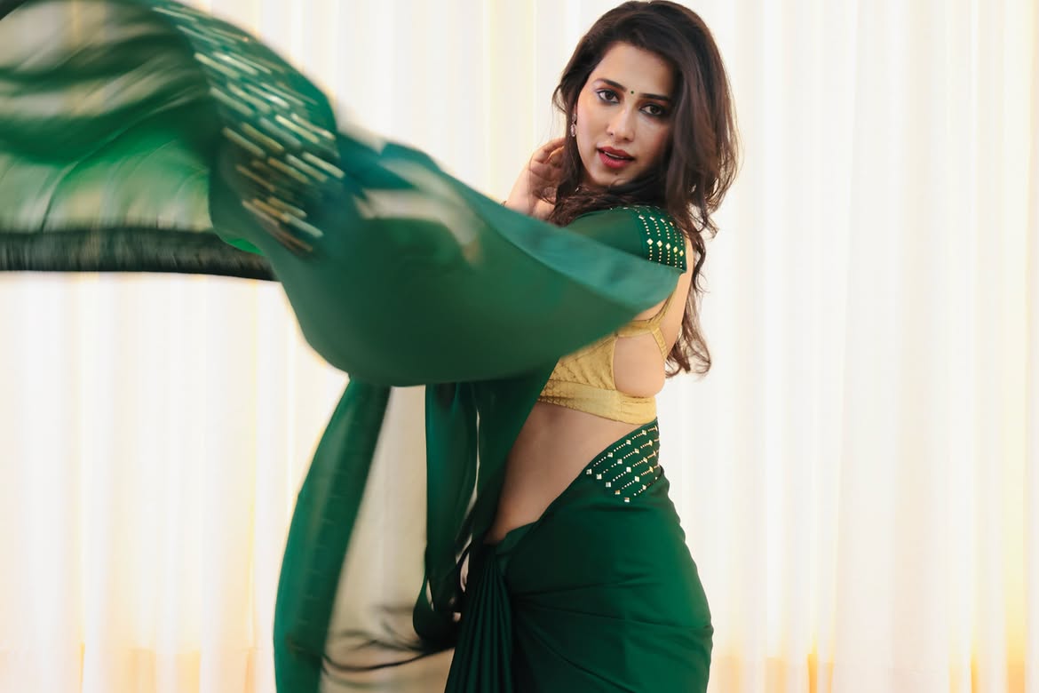 Priya Hegde Striking A Playful Pose Indoors Saree