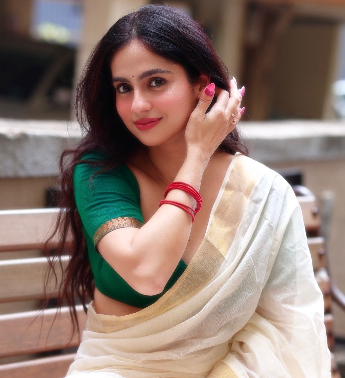 Rose Sardana Tucking Hair Behind Ear In Saree