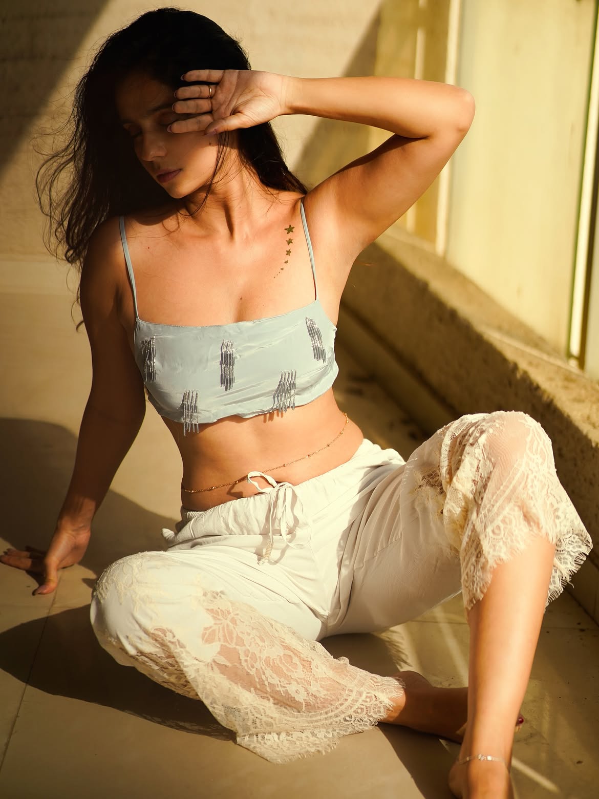 Rose Sardana Chic White Lace Pants Fashion Pose
