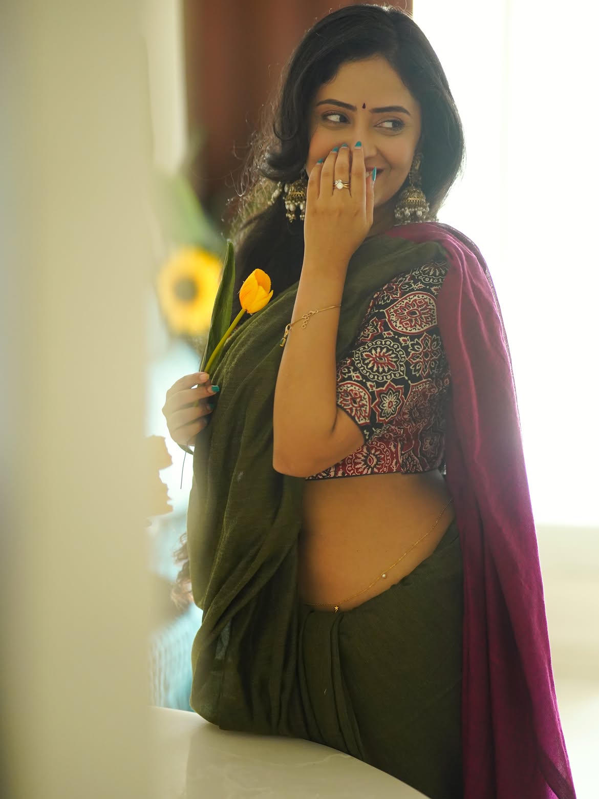 Sanya Thakur Carries Floral Mood With Warm Smile
