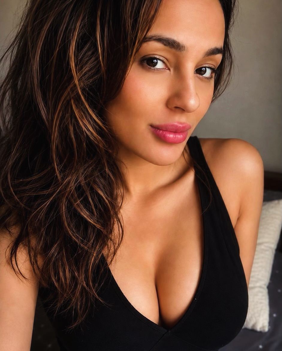 Seerat Kapoor In Black Top Looking At Camera