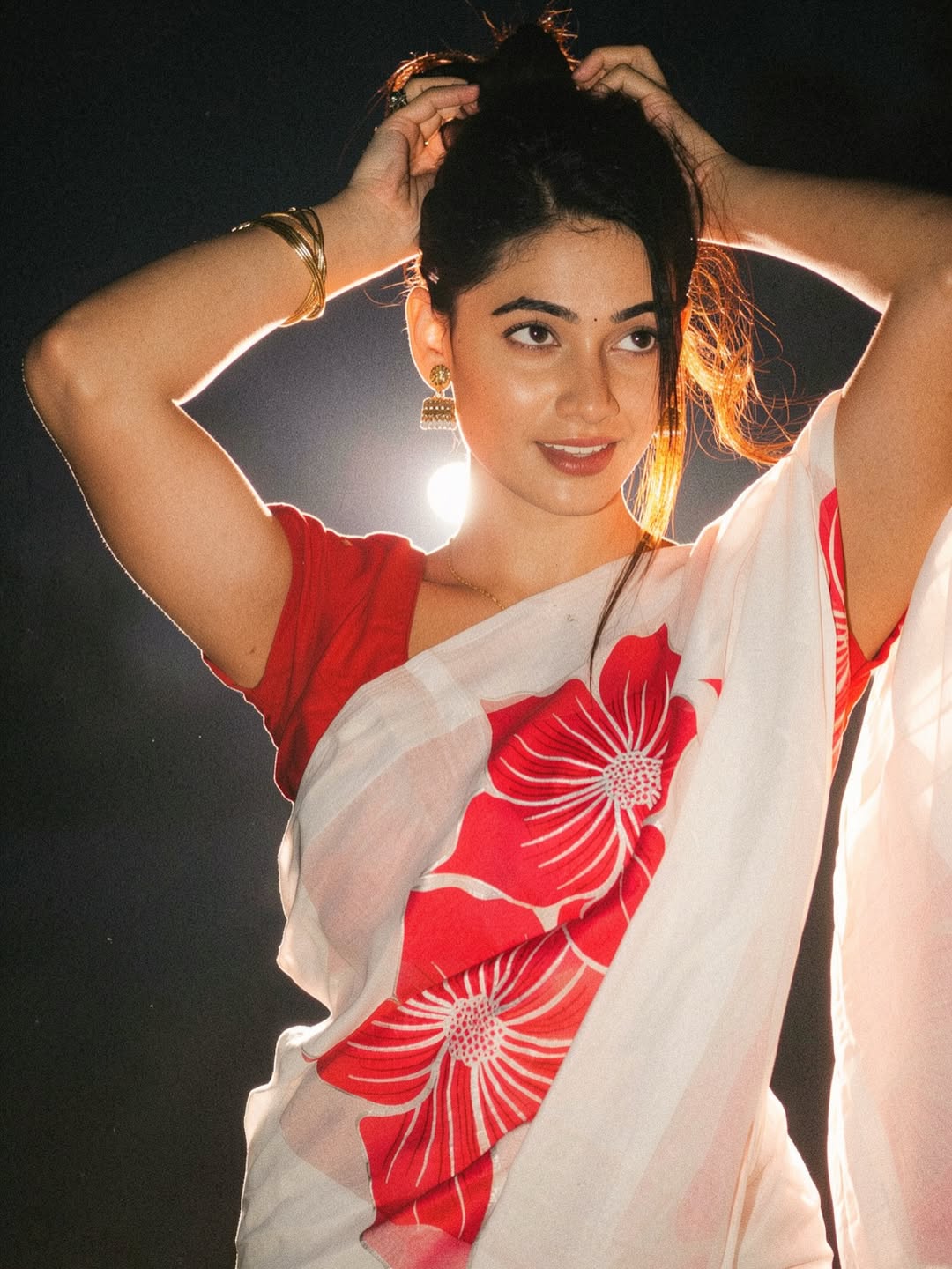 Spandana Palli Poses In Red Floral White Saree