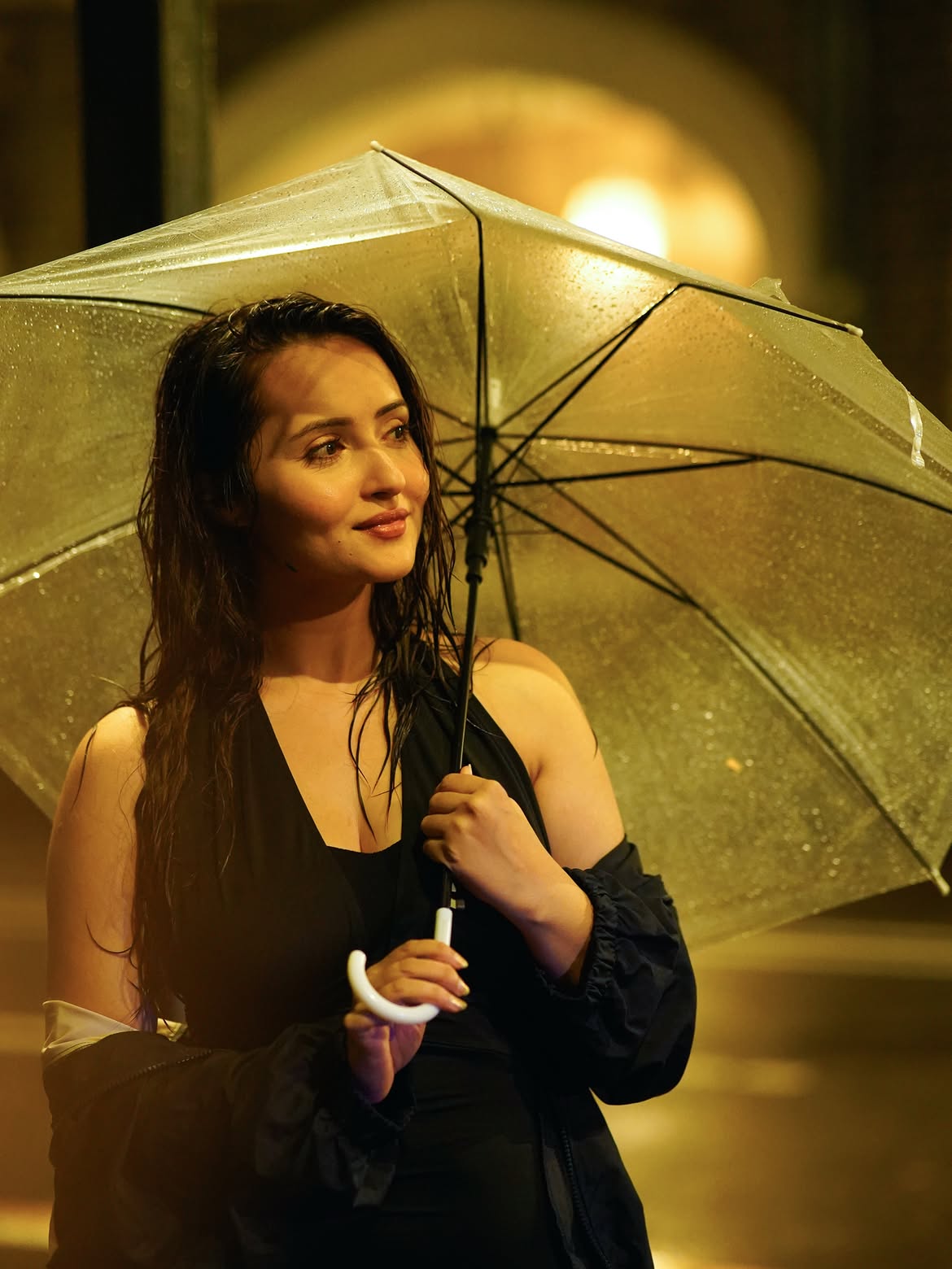 Varsha Rekhate Strikes Elegant Rainy Night Pos