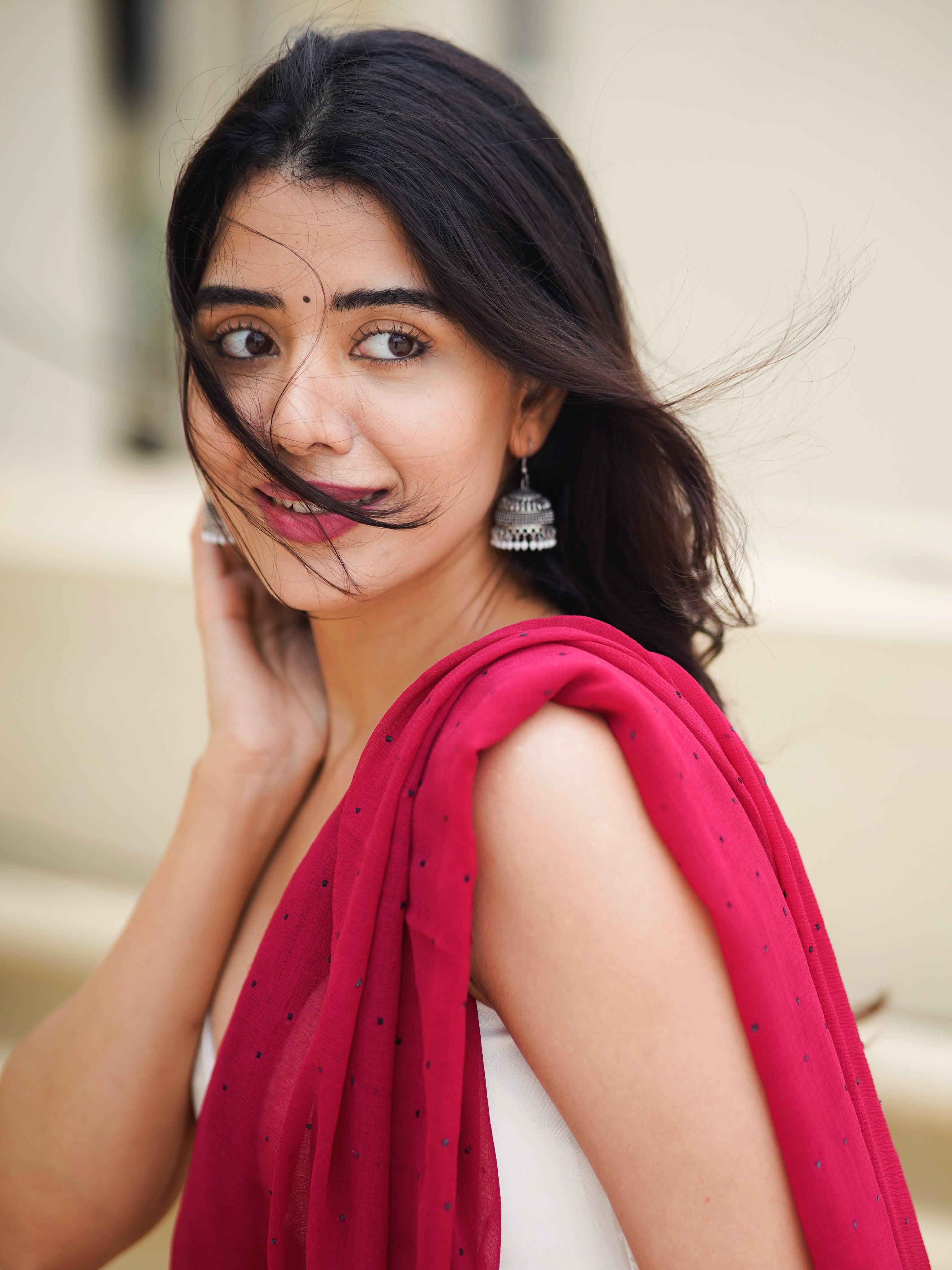 Aarti Chikara Smiles In A Striking Crimson Saree