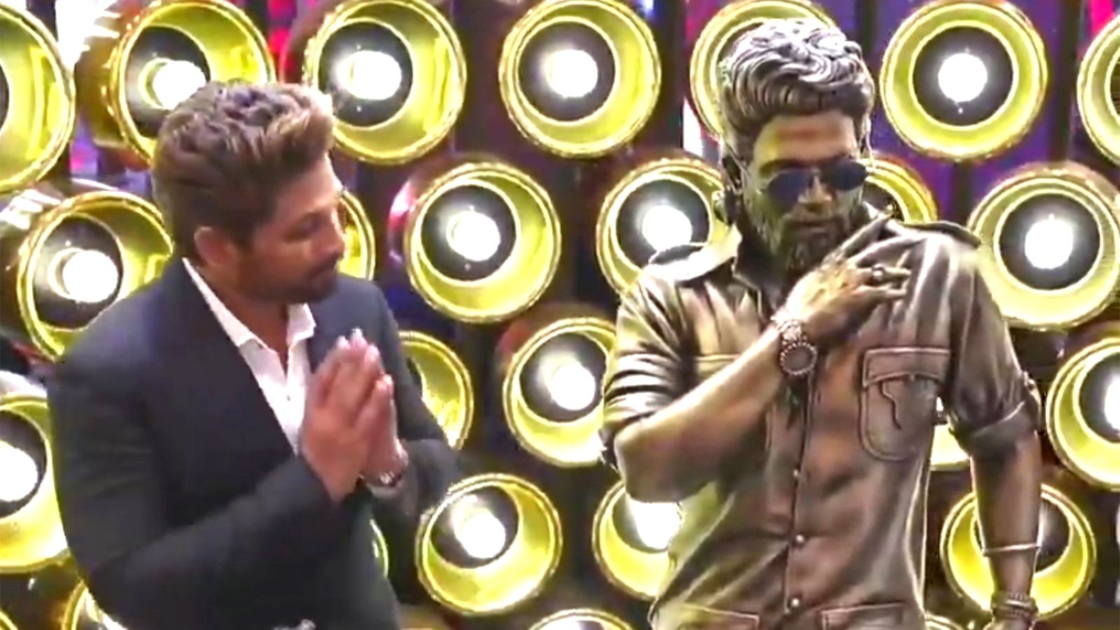 Allu Arjun greets his Pushpa statue