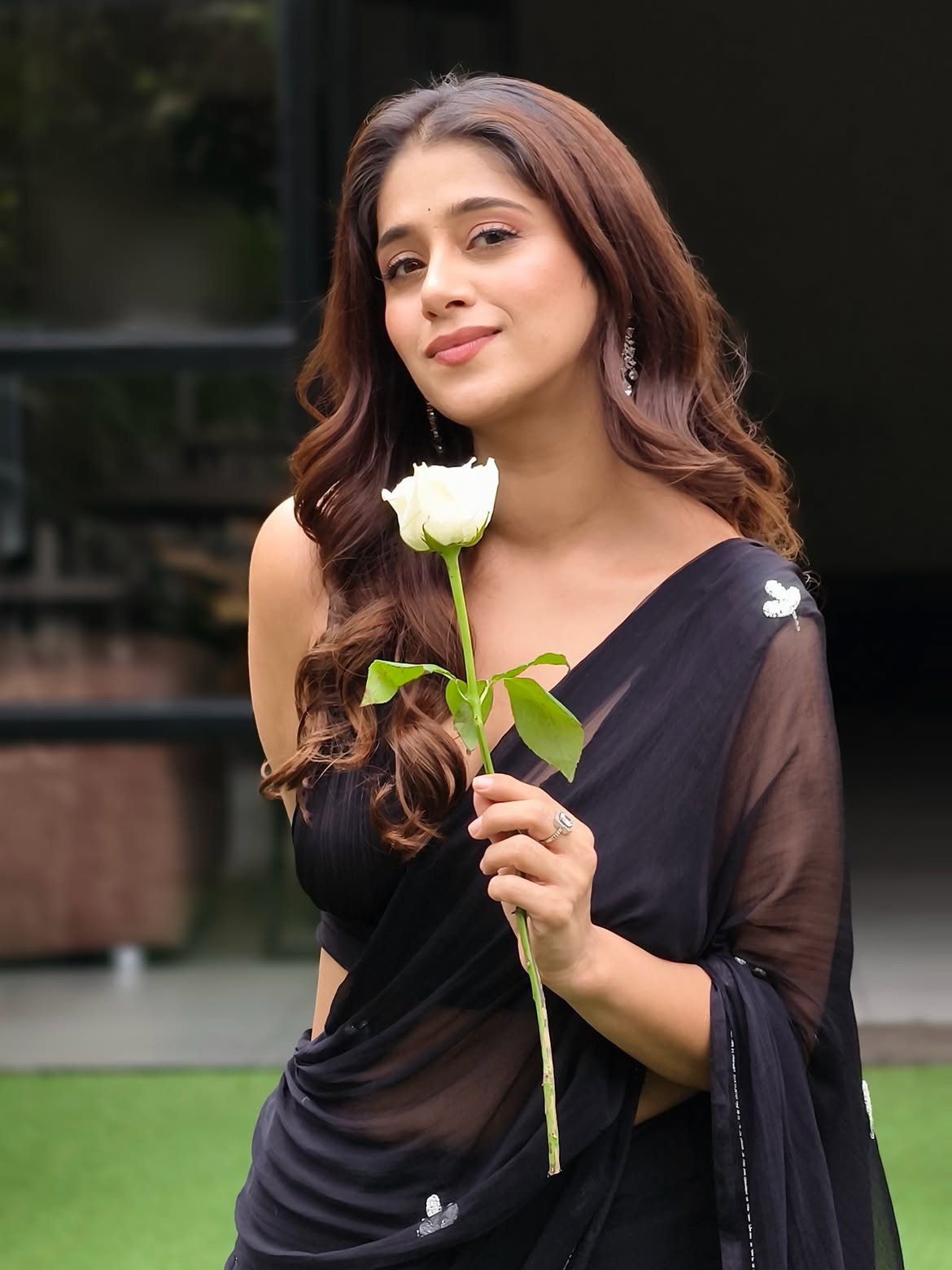 Chandni Bhagwananii Poses In A Chic Black Saree!