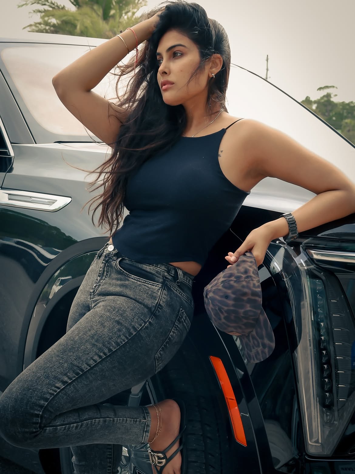 Divi Vadthya Stylish Look Against Premium SUV Front