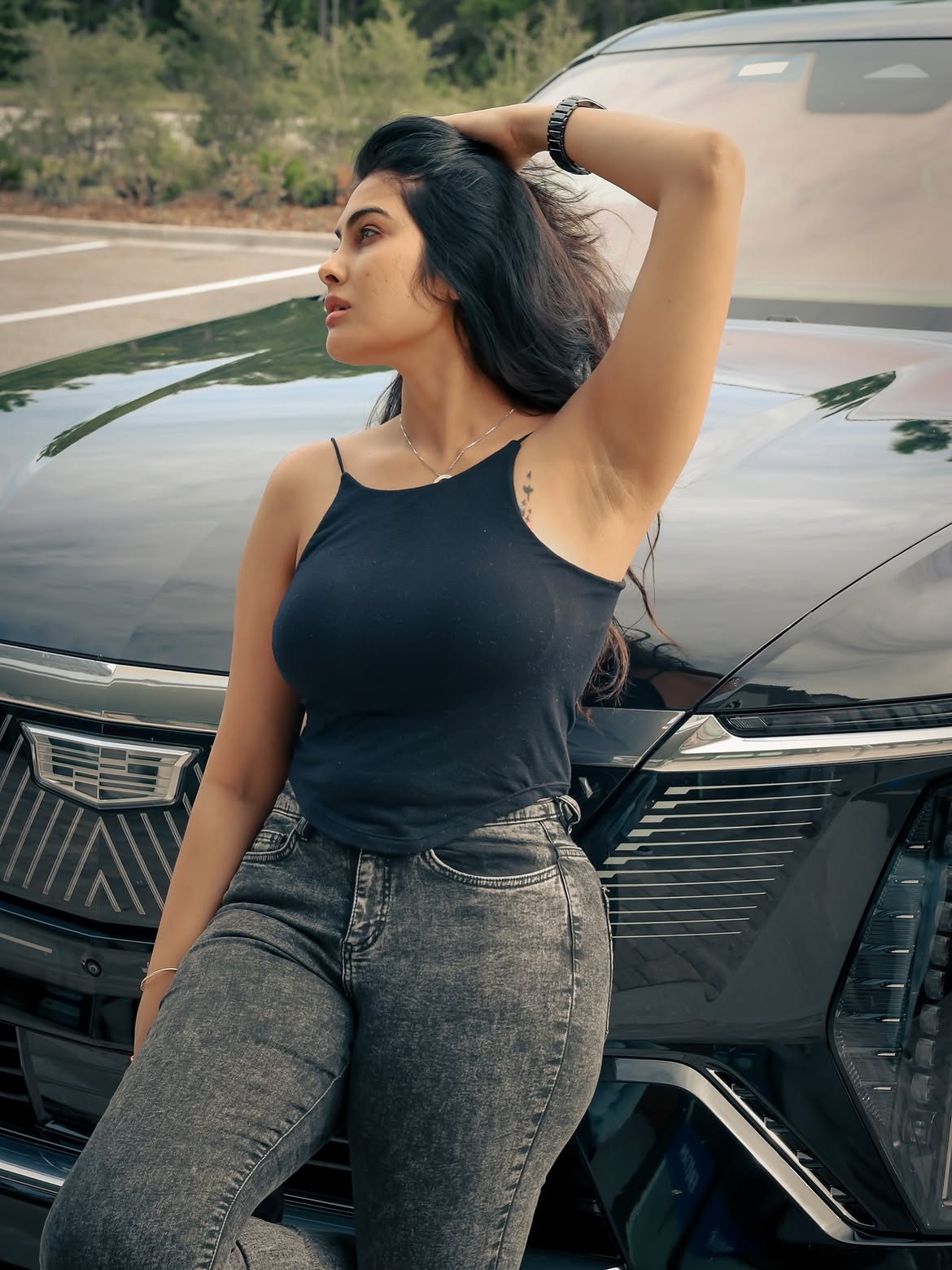 Divi Vadthya Poses Beside Luxury SUV With Style