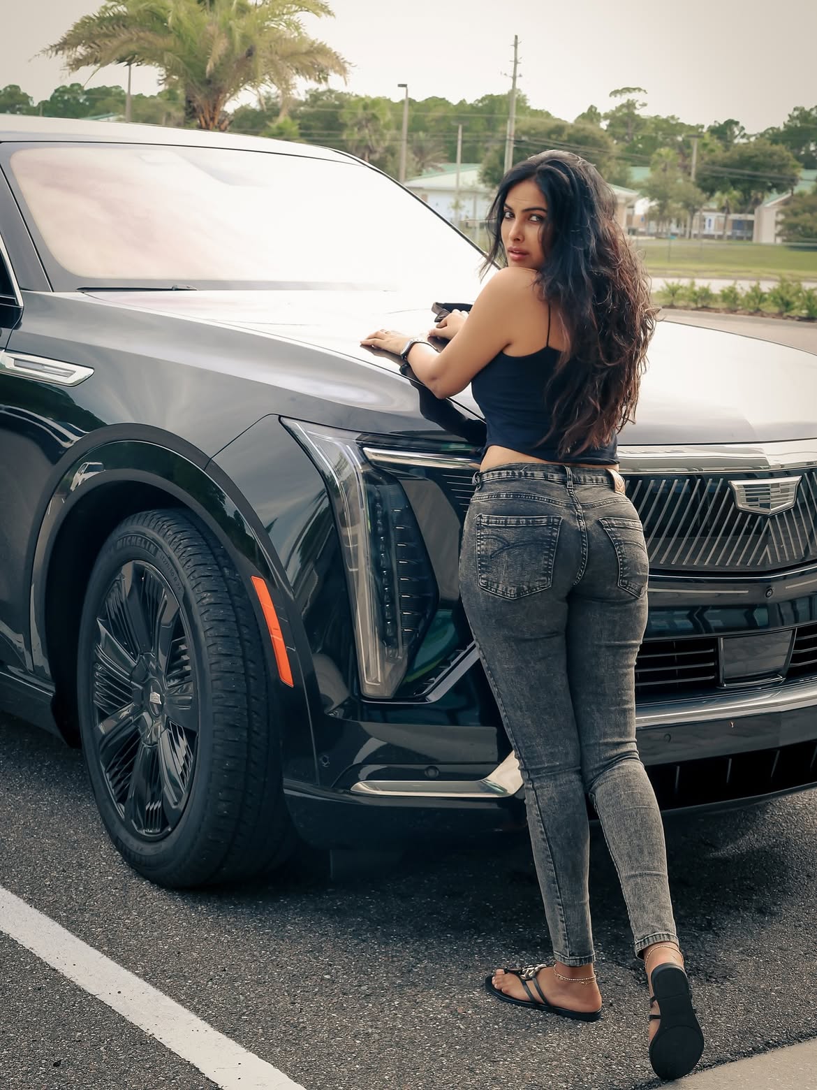 Divi Vadthya Poses Beside Luxury SUV With Style
