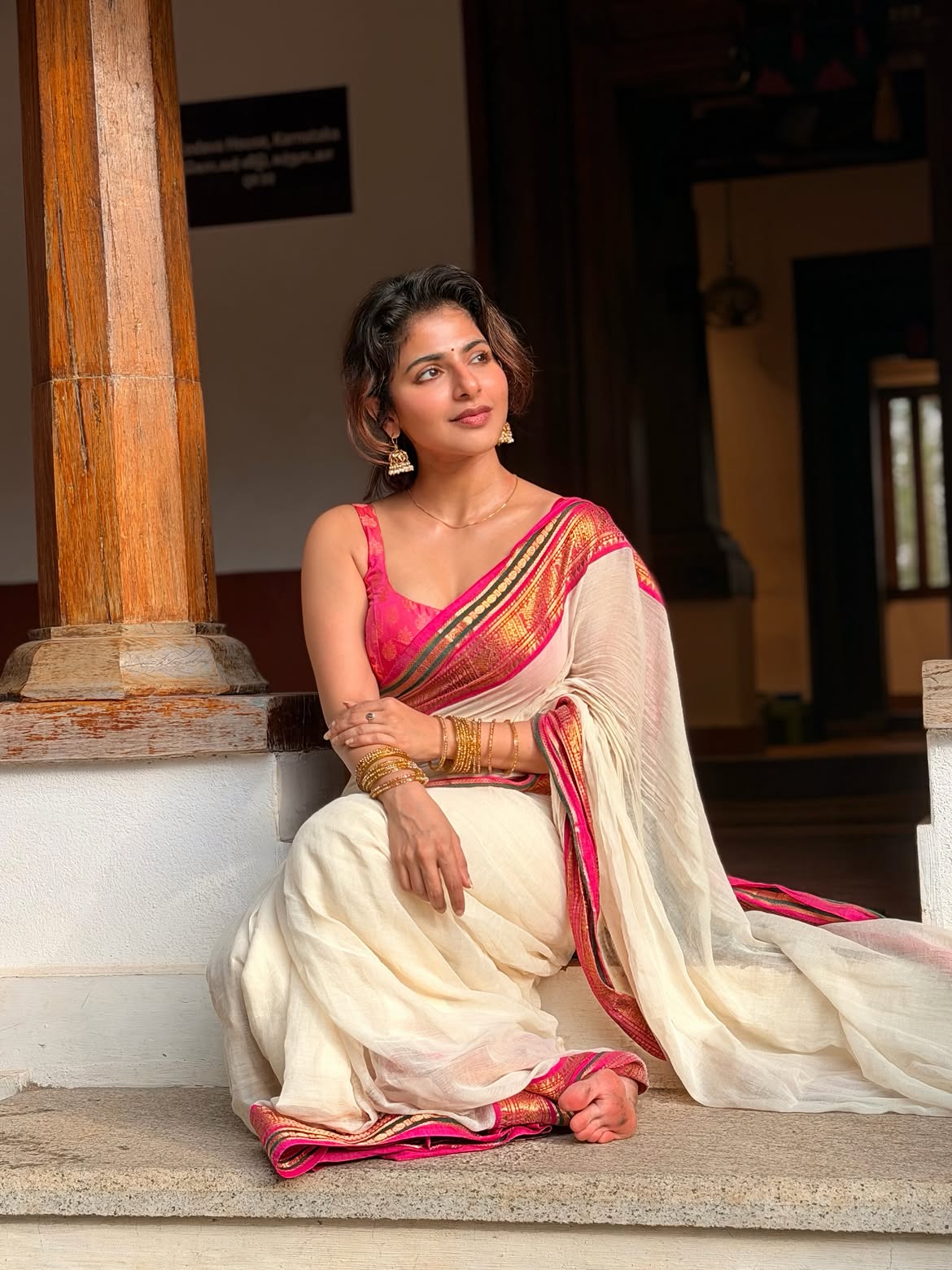 Iswarya Menon Sitting Gracefully In Kerala Saree Look