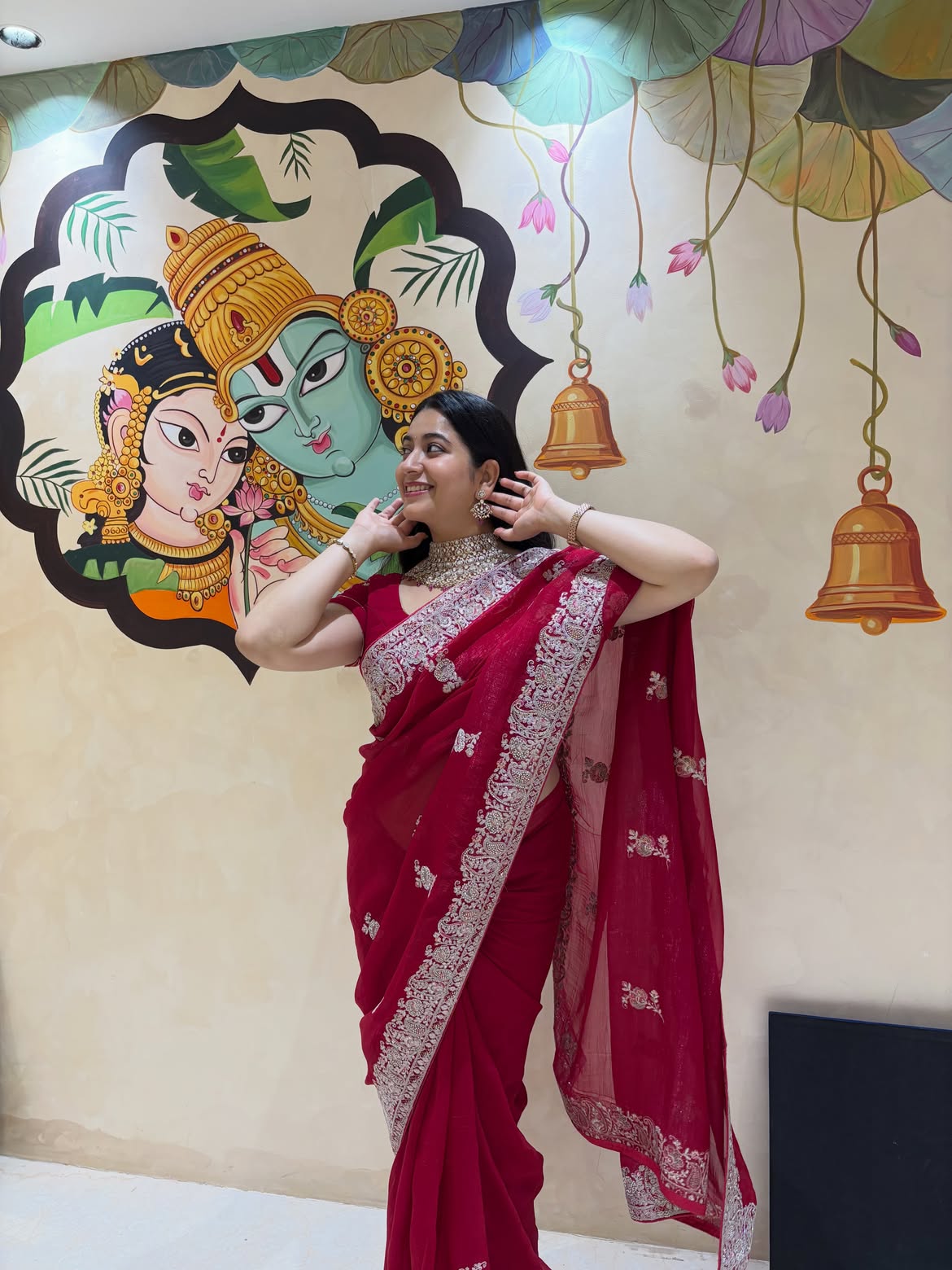 K Sudha Poses Before Divine Wall Art Beautifully