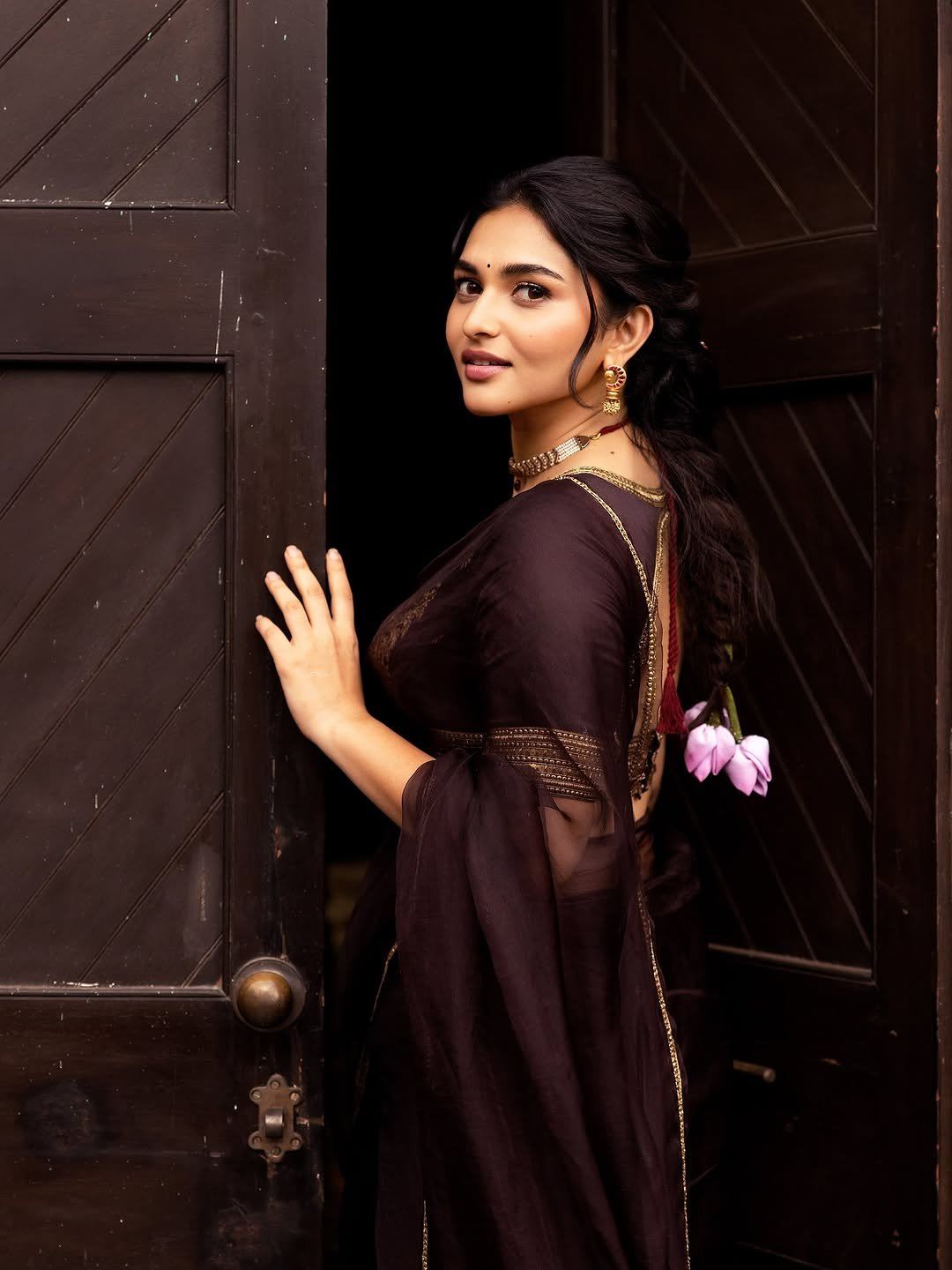 Kayadu Lohar Regal Pose At Wooden Door Entrance