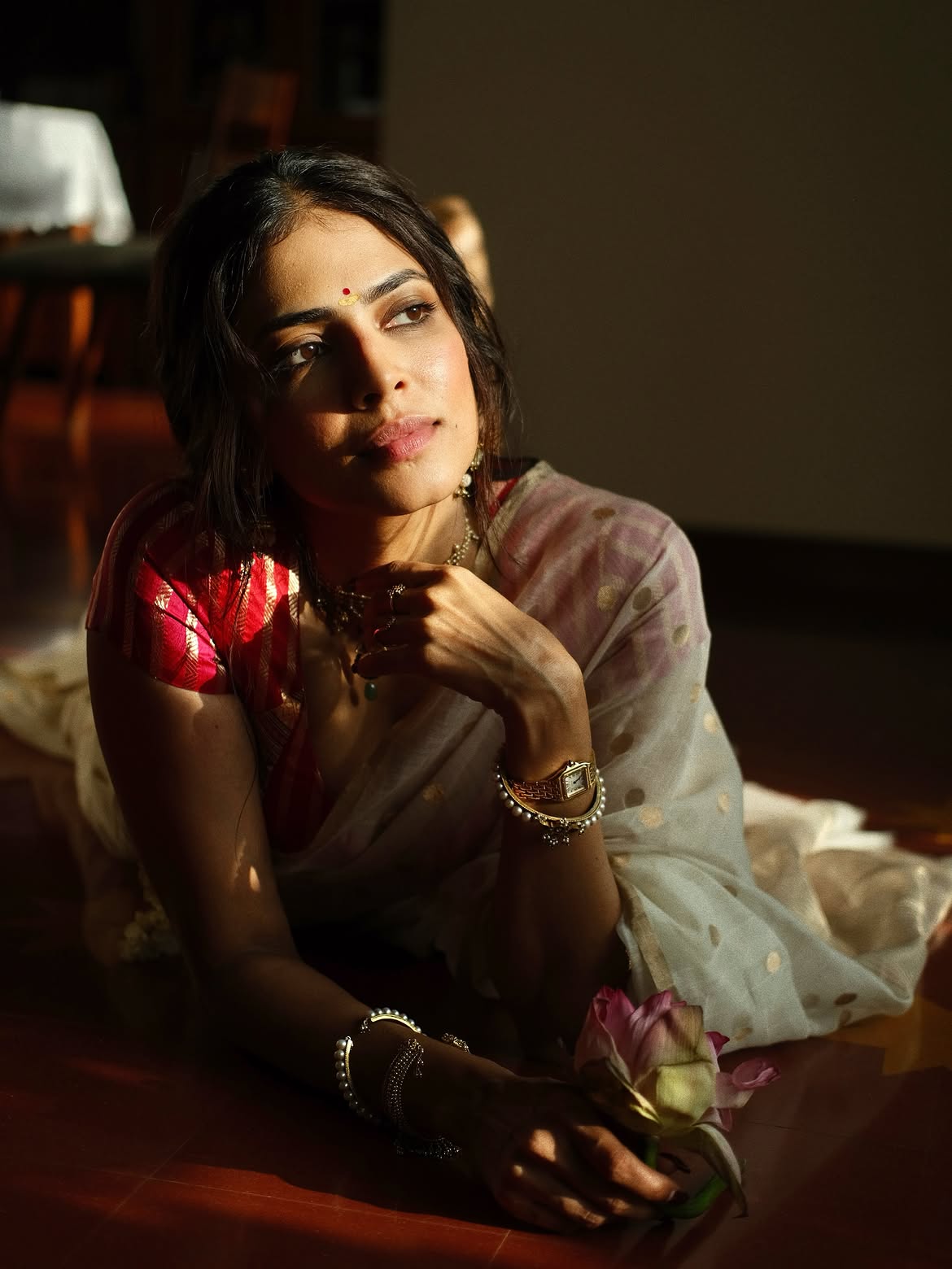 Malavika Mohanan In Elegant White Saree Pose