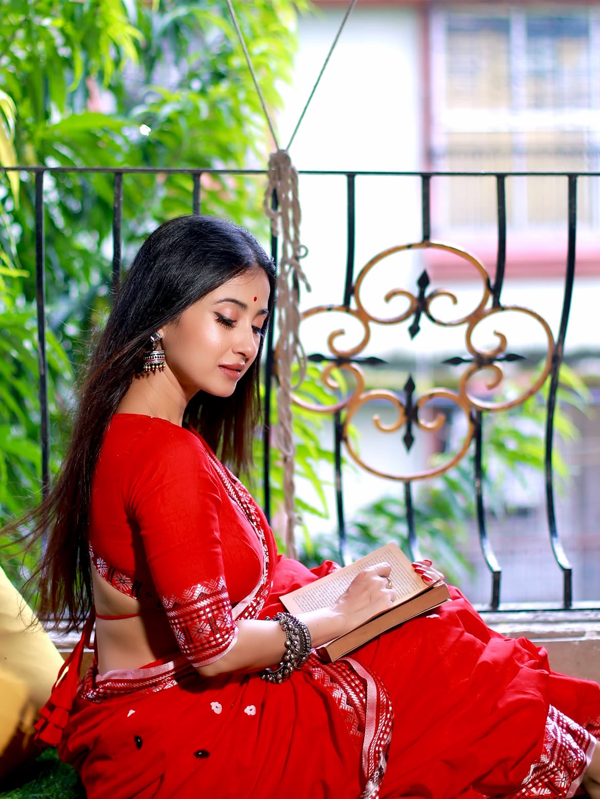 Monami Ghosh Gracefully Posing In Red Saree Look