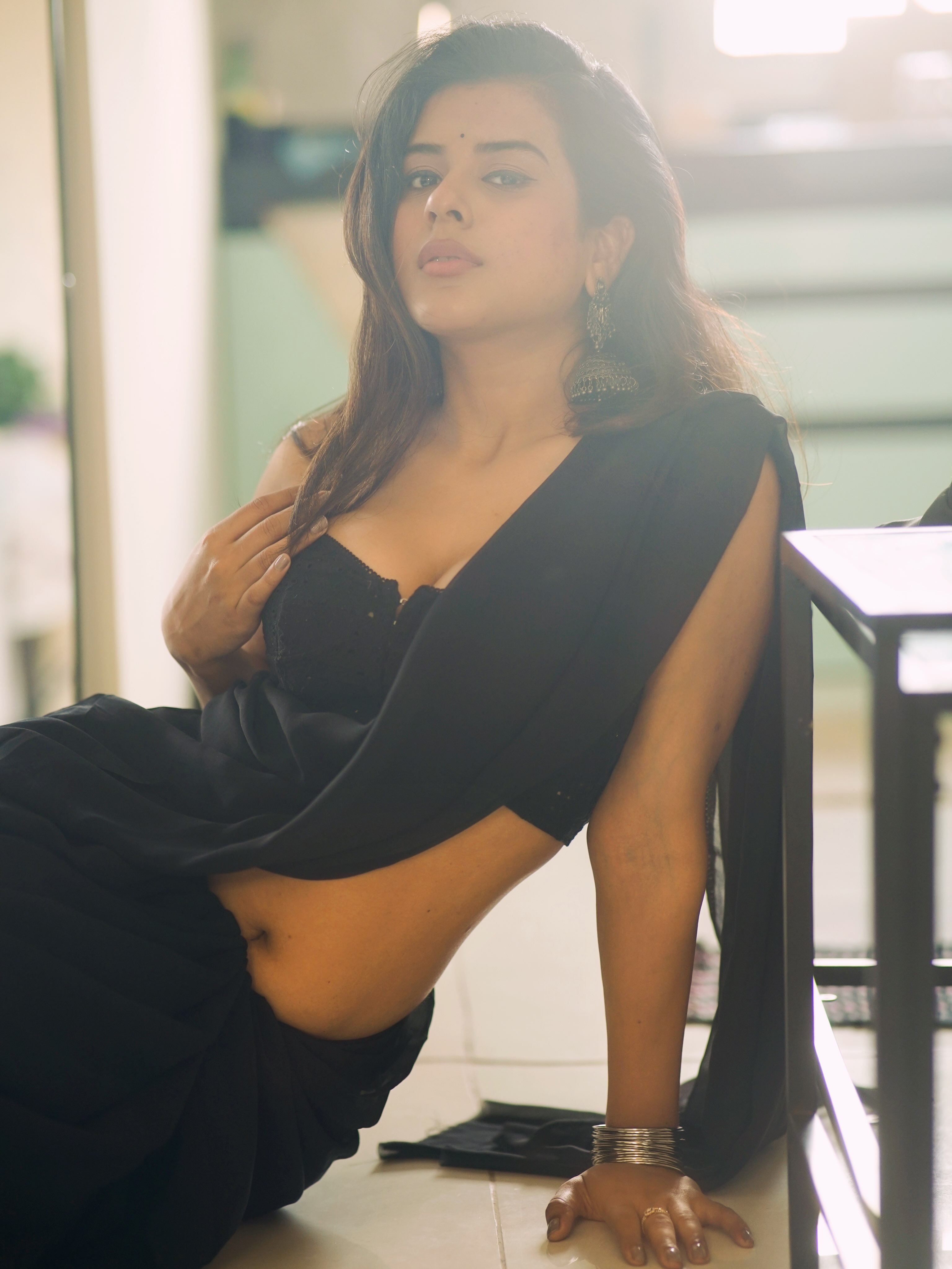 Nidhi Dudhraj Smiles In Elegant Black Saree Look