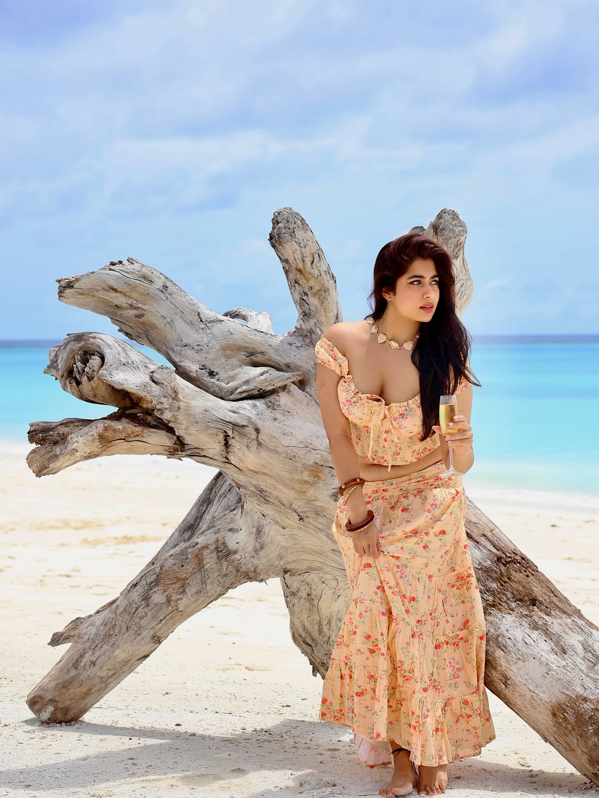 Nikita Sharma In Floral Beachwear With Chic Pose