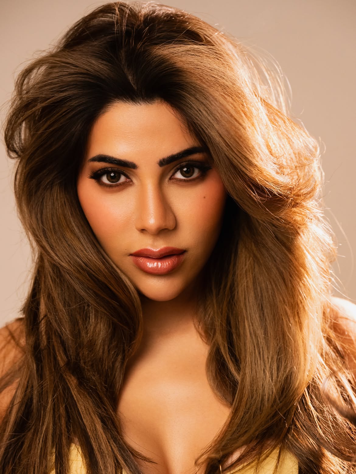 Nikki Tamboli Golden Glow With Chic Expression