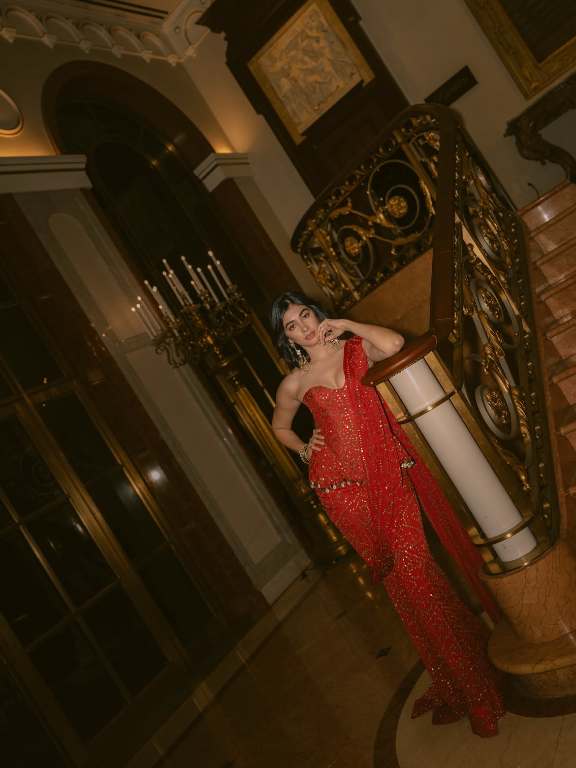 Pooja Hegde Poses By Mirror In Red Saree Elegance