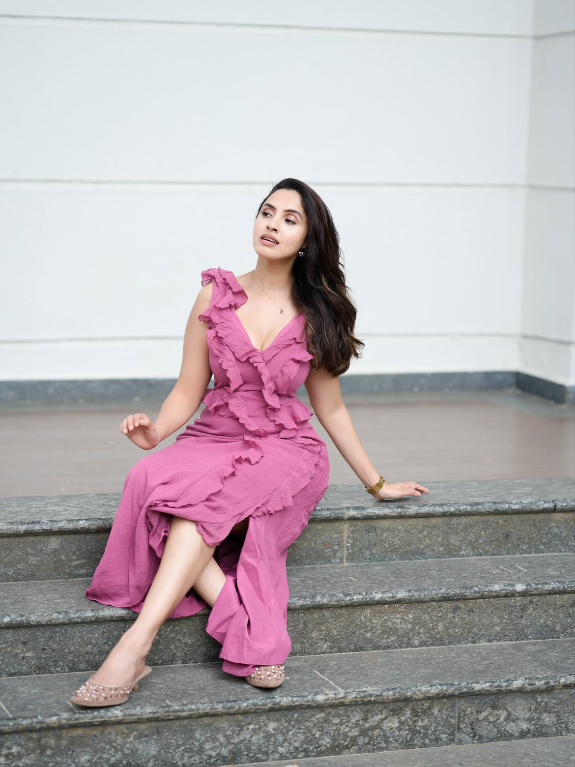 Relaxed Seated Portrait In Elegant Pink Dress Style