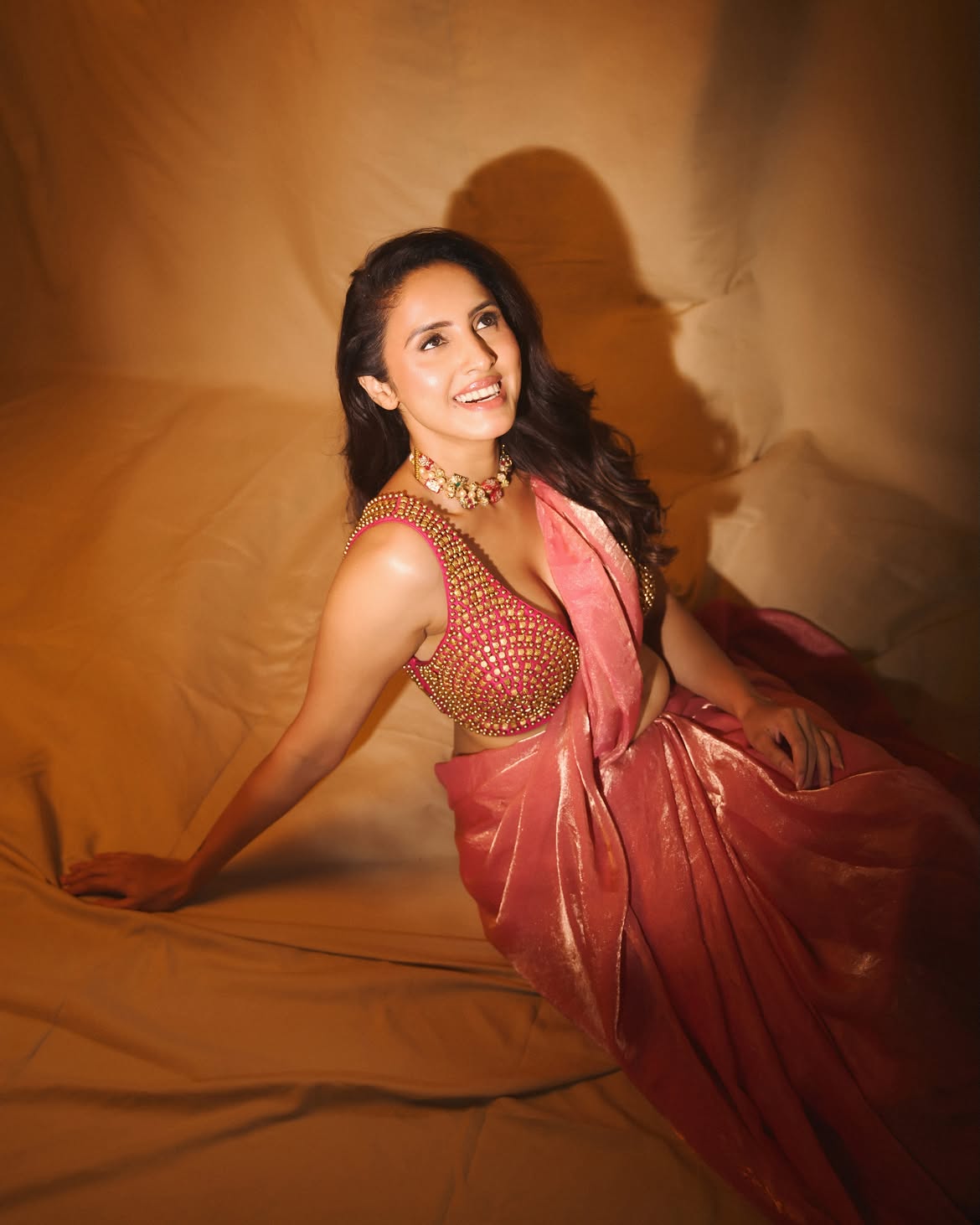Priyanka Kholgade Smiles In Chic Pink Saree Glow