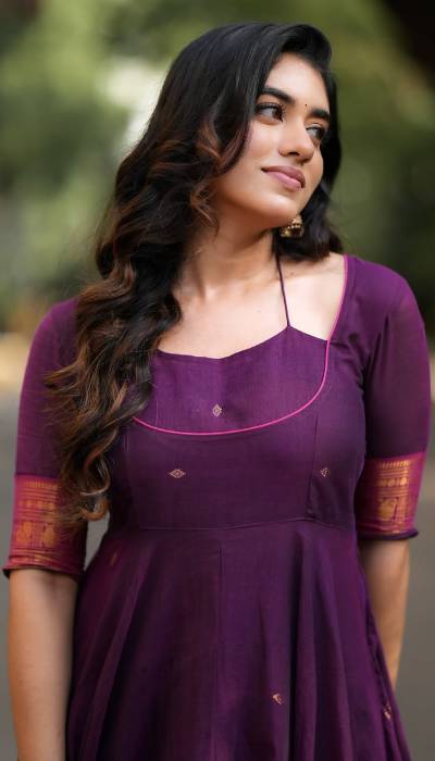 Ramya In Purple Ethnic Dress With Gold Detailing