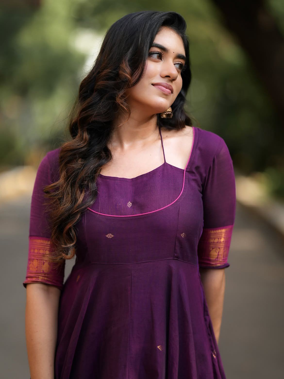 Ramya In Purple Dress With Elegant Body Language