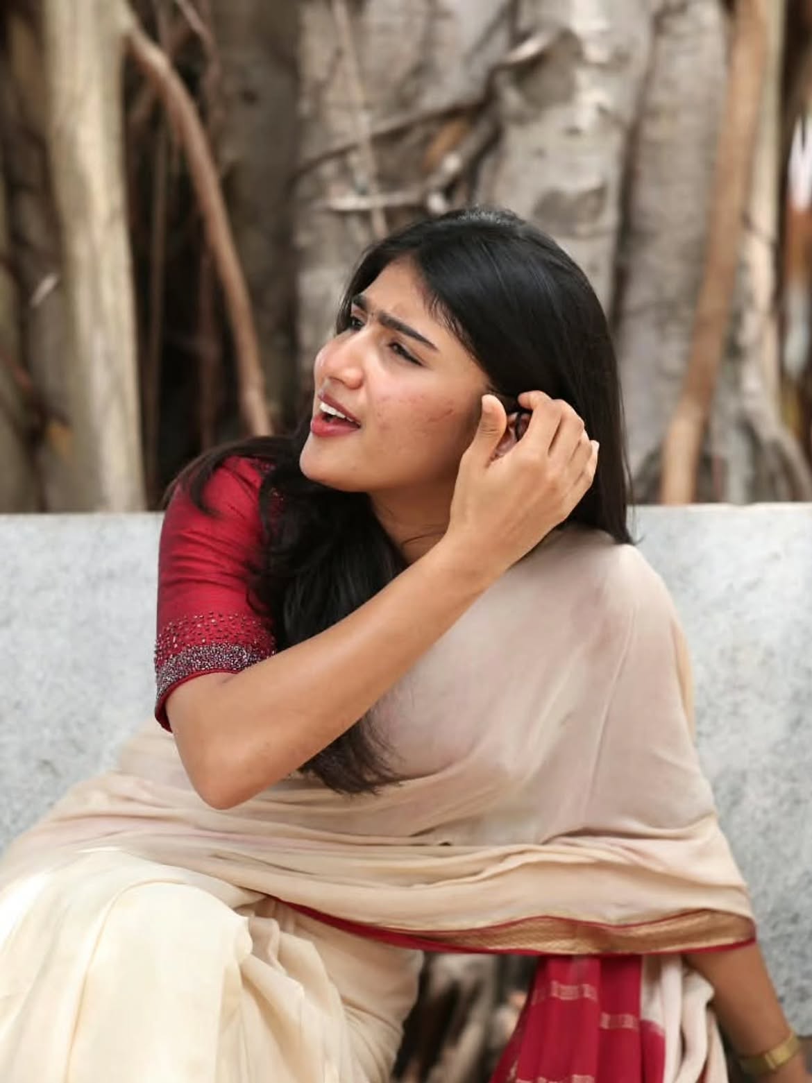 Riya Shibu Smiles Brightly In Cream Saree Portrait