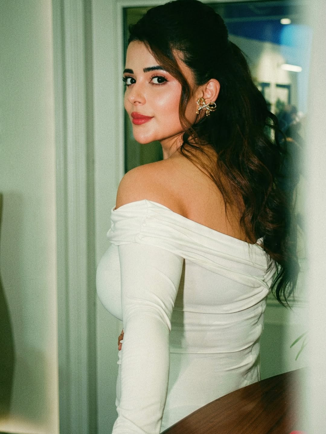 Roopsha Poses In A White Off Shoulder Dress Look