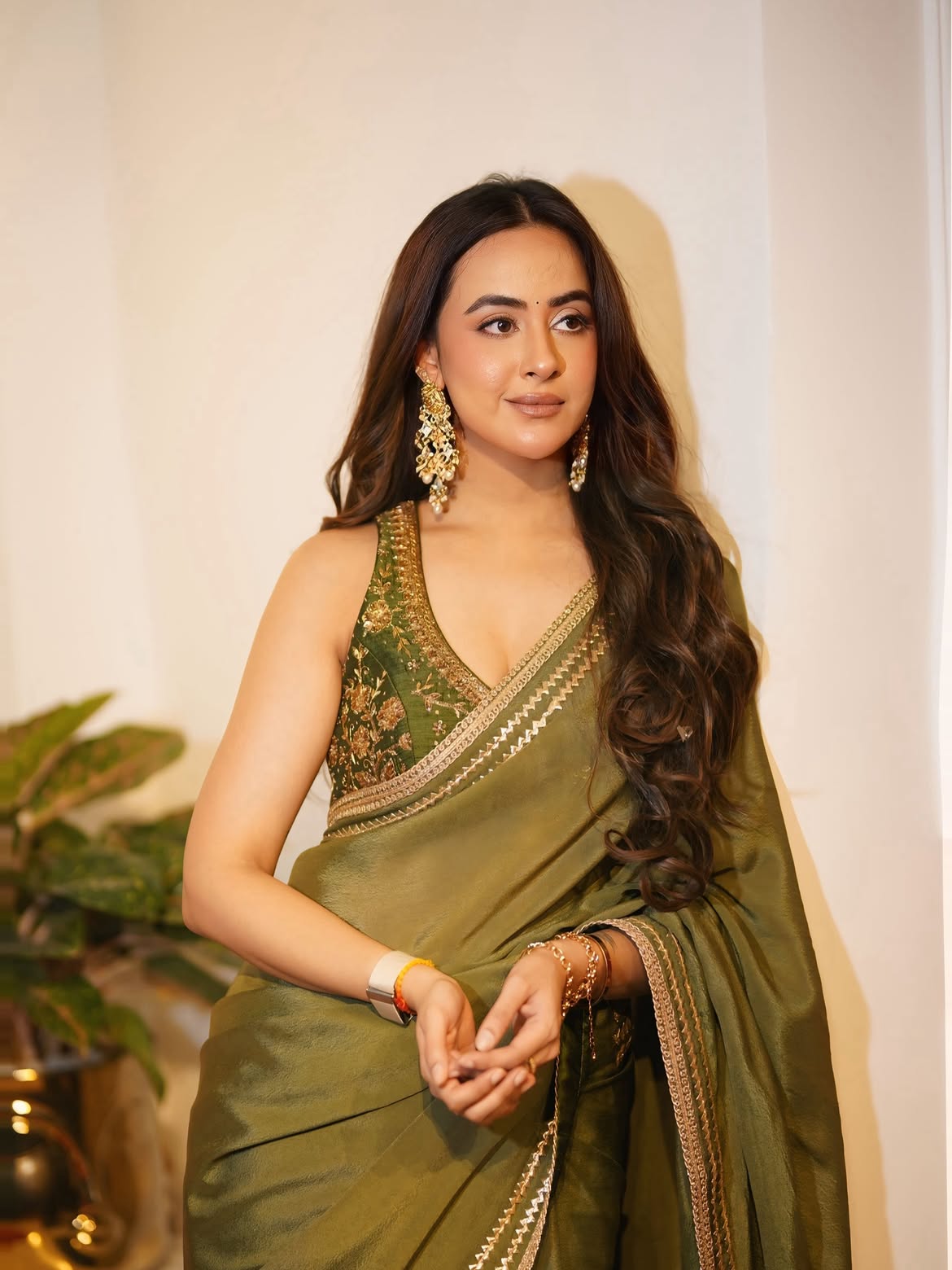 Amiksha Pawar Poses In An Olive Green Saree Look