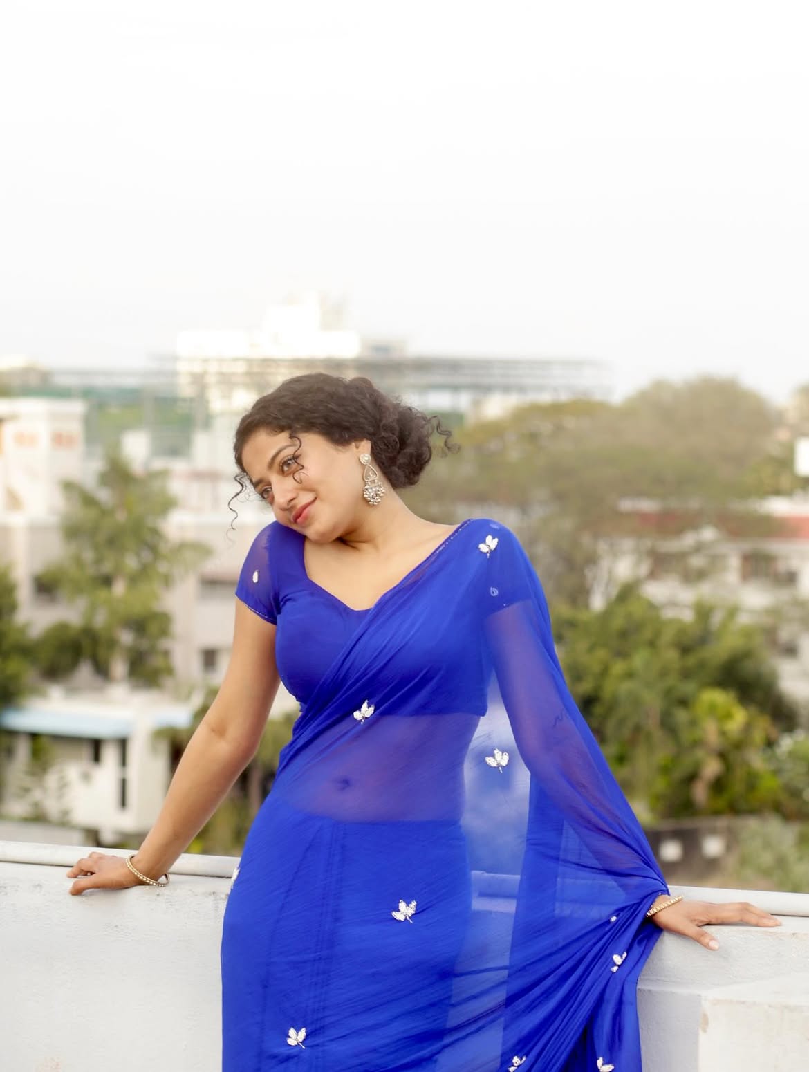 Anjali Prabhakaran Poses In A Blue Saree Outside