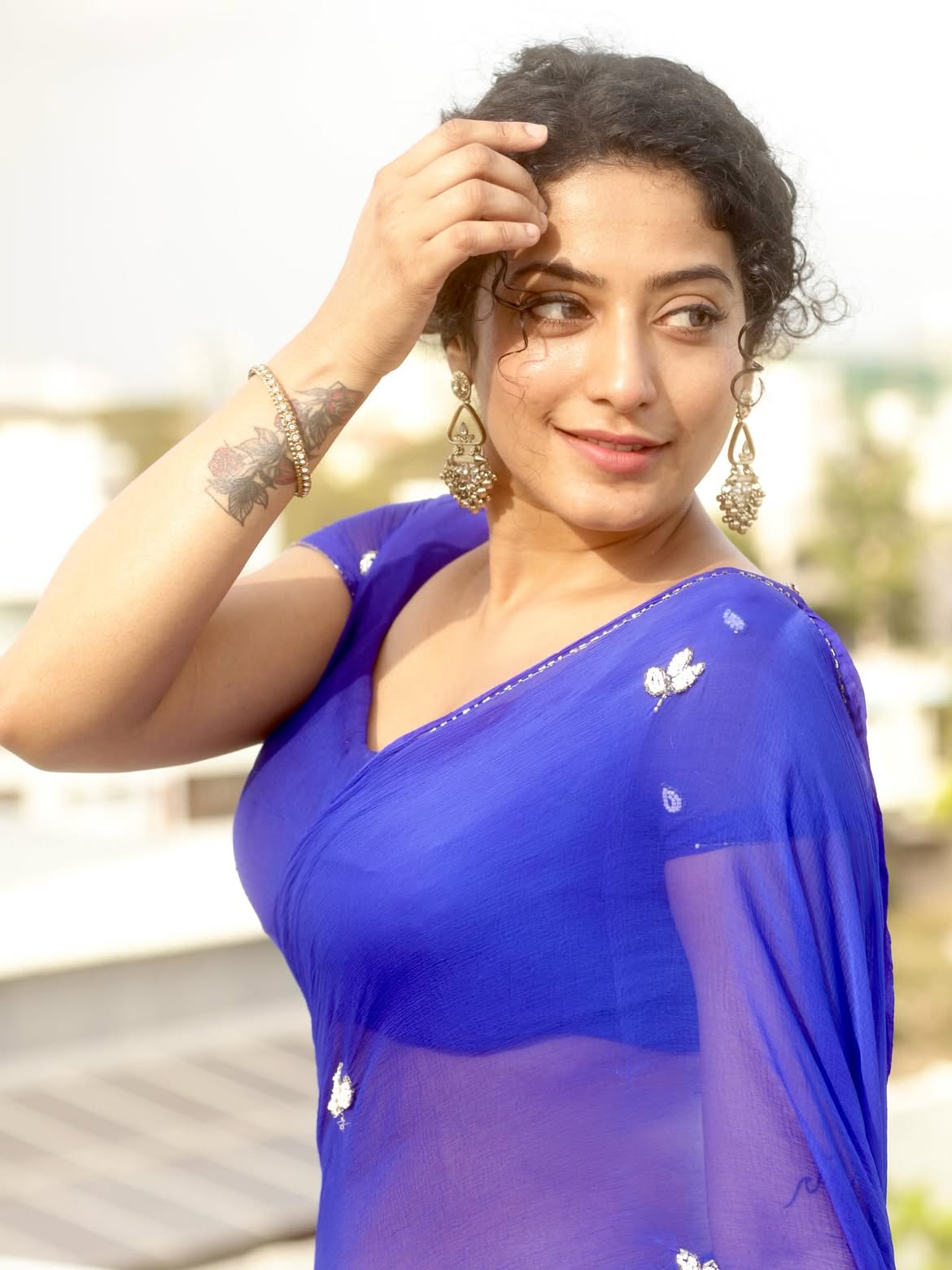 Anjali Prabhakaran With Curly Hair In Blue Saree