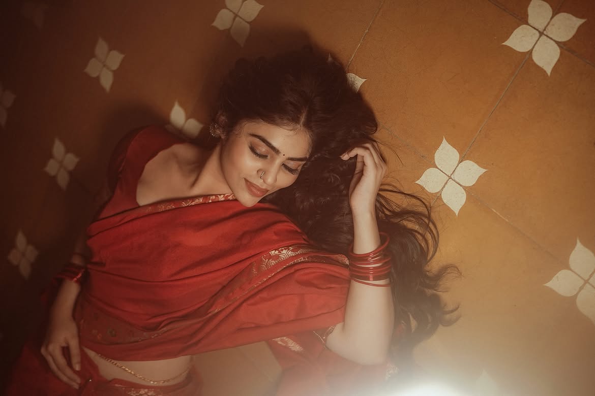 Bandhavi Sridhar Reclines In A Classic Red Saree