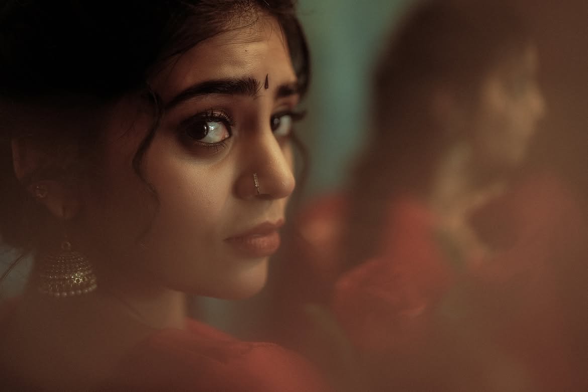 andhavi Sridhar Captures A Moody Red Saree Look