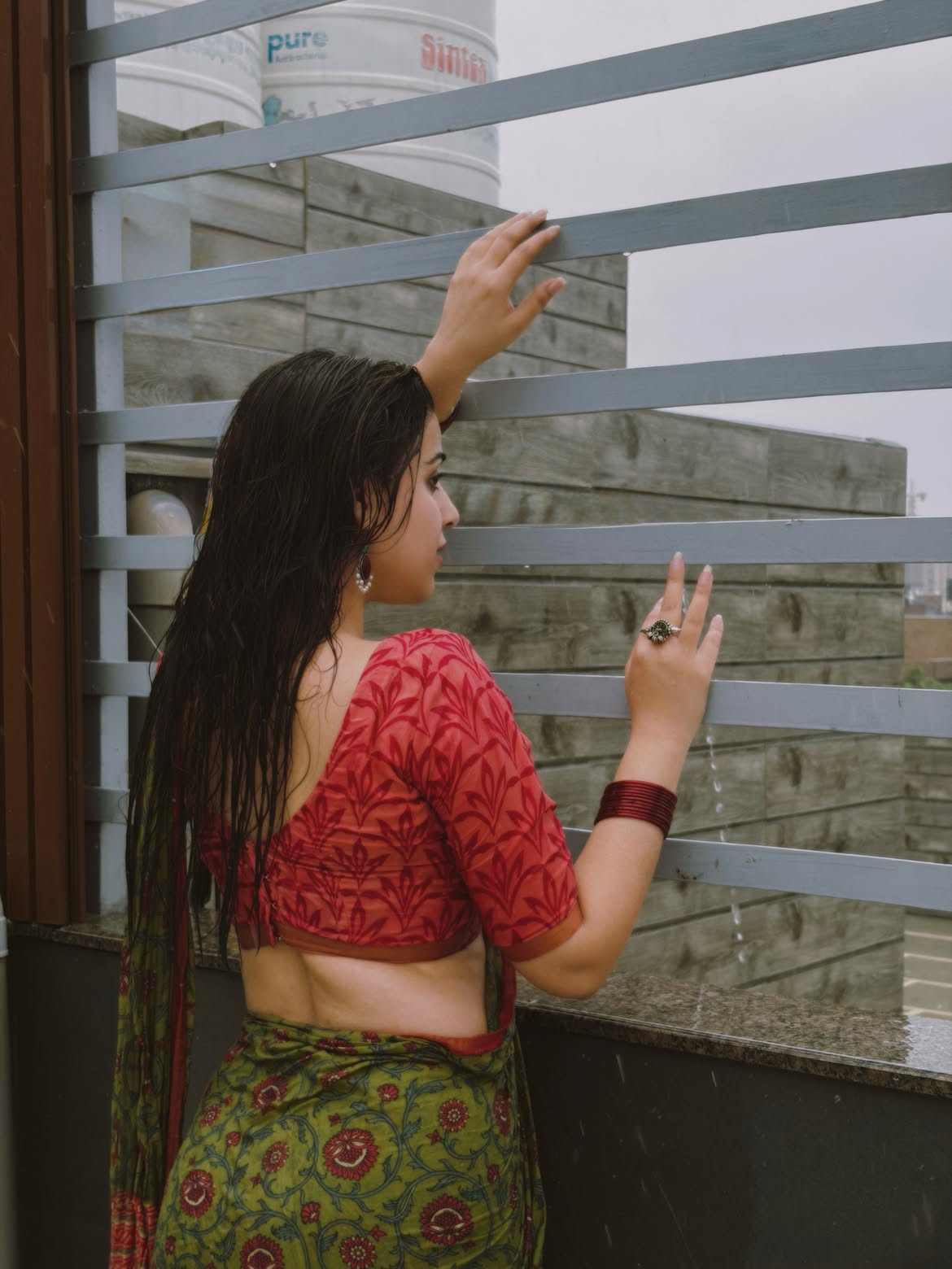 Mahi Gaur Posing In A Backless Red Blouse Design