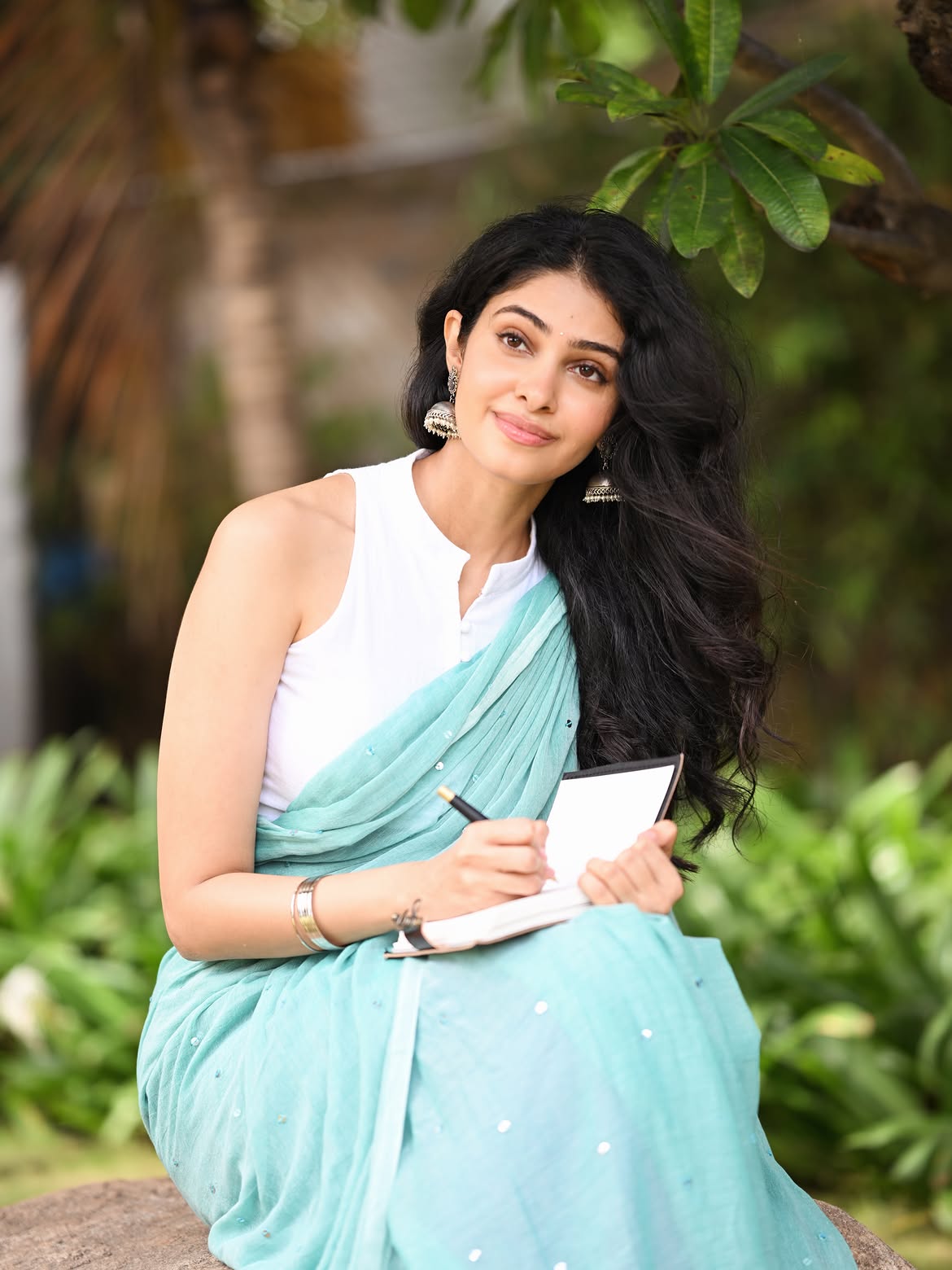 Manasa Varanasi In Teal Saree With Silver Jhumka