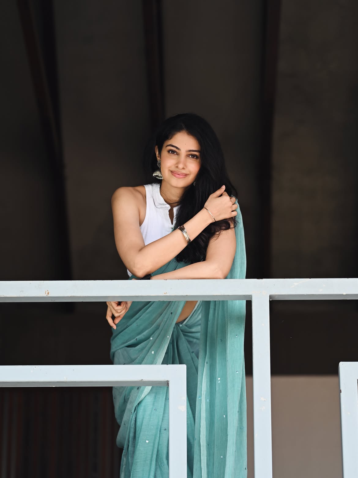 Manasa Varanasi Smiling In A Serene Outdoor Pose