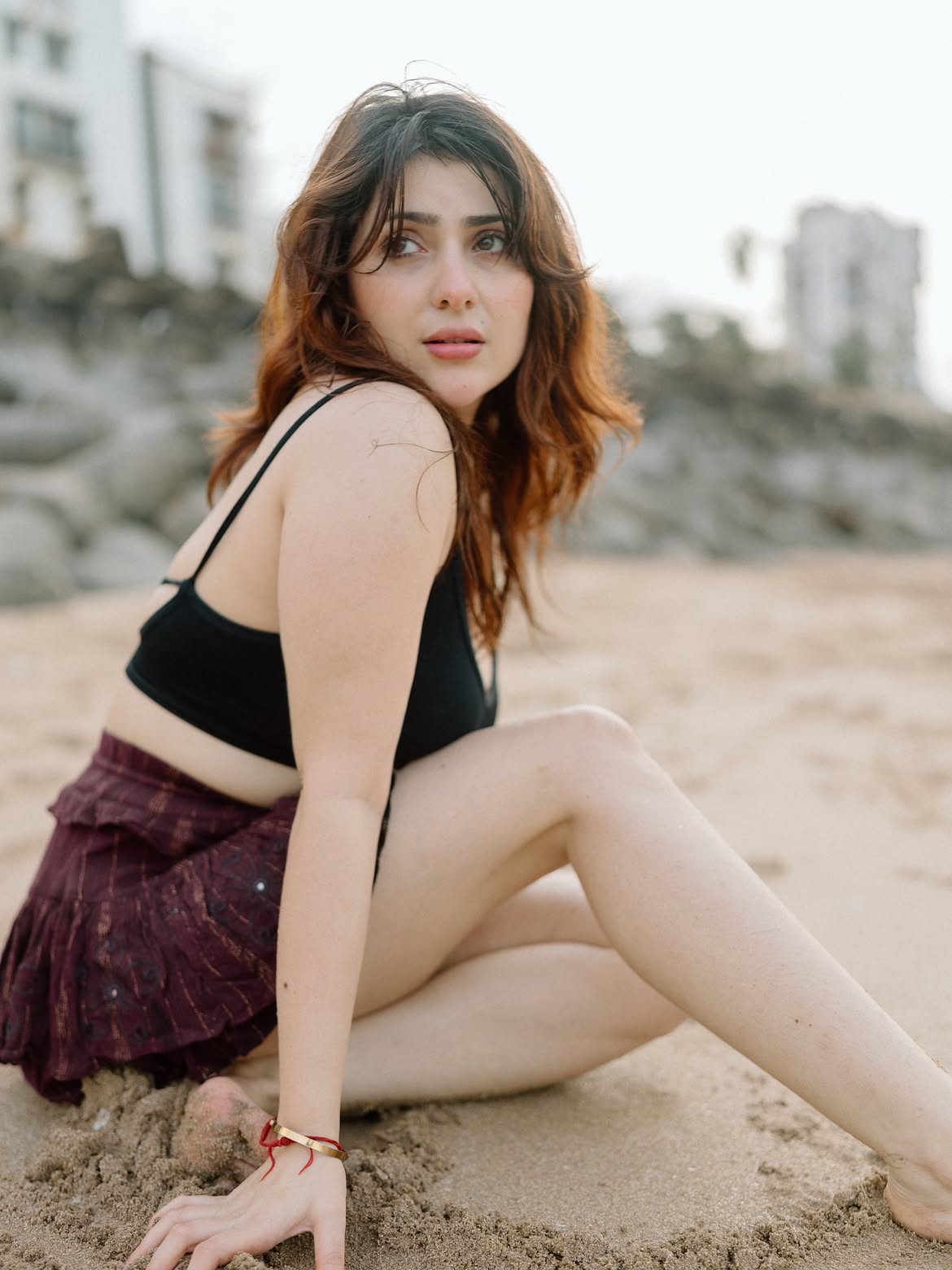 Naazukmadanlochan Strikes A Playful Beach Pose