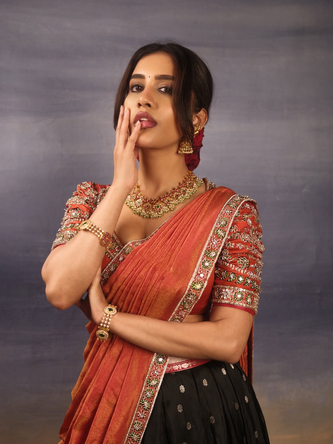 Nabha Natesh In A Black Skirt And Rust Saree
