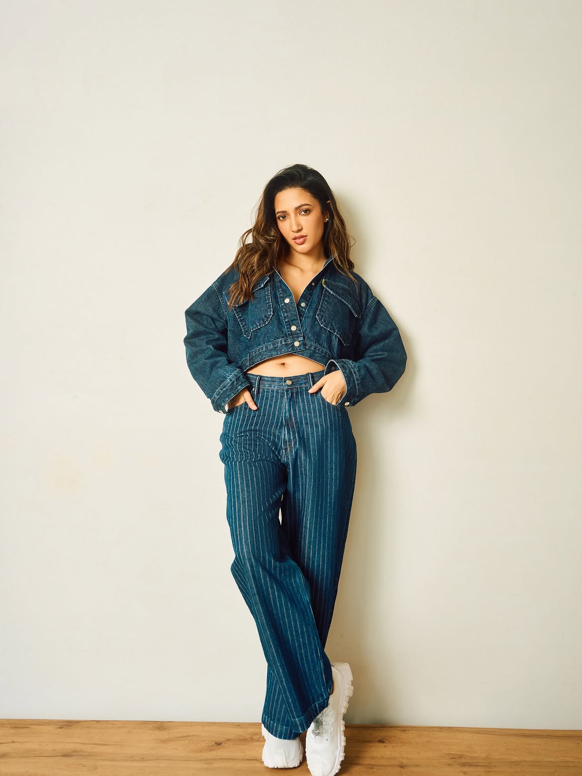 Neha Shetty Poses In Blue Denim With Fresh Flair