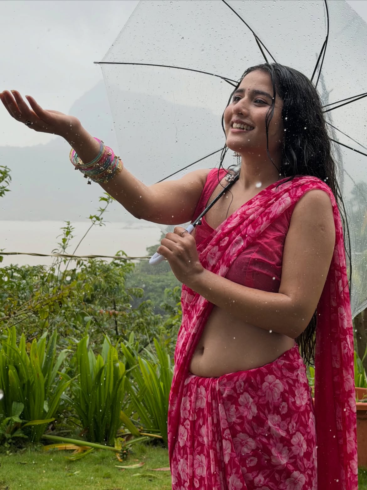 Payal Gupta Holding A Clear Umbrella In The Rain