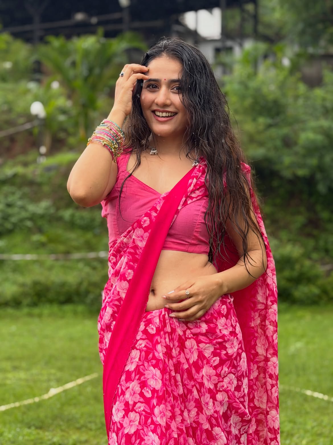 Payal Gupta Smiling Sweetly In Floral Pink Saree