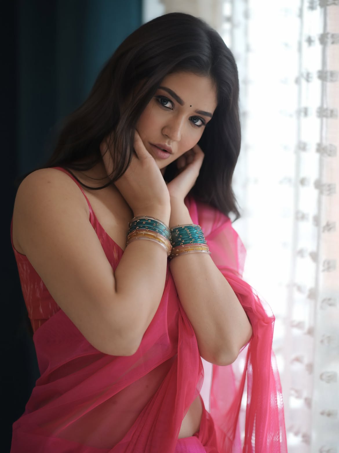 Priyanka Jawalkar Poses In Pink Saree By Curtain