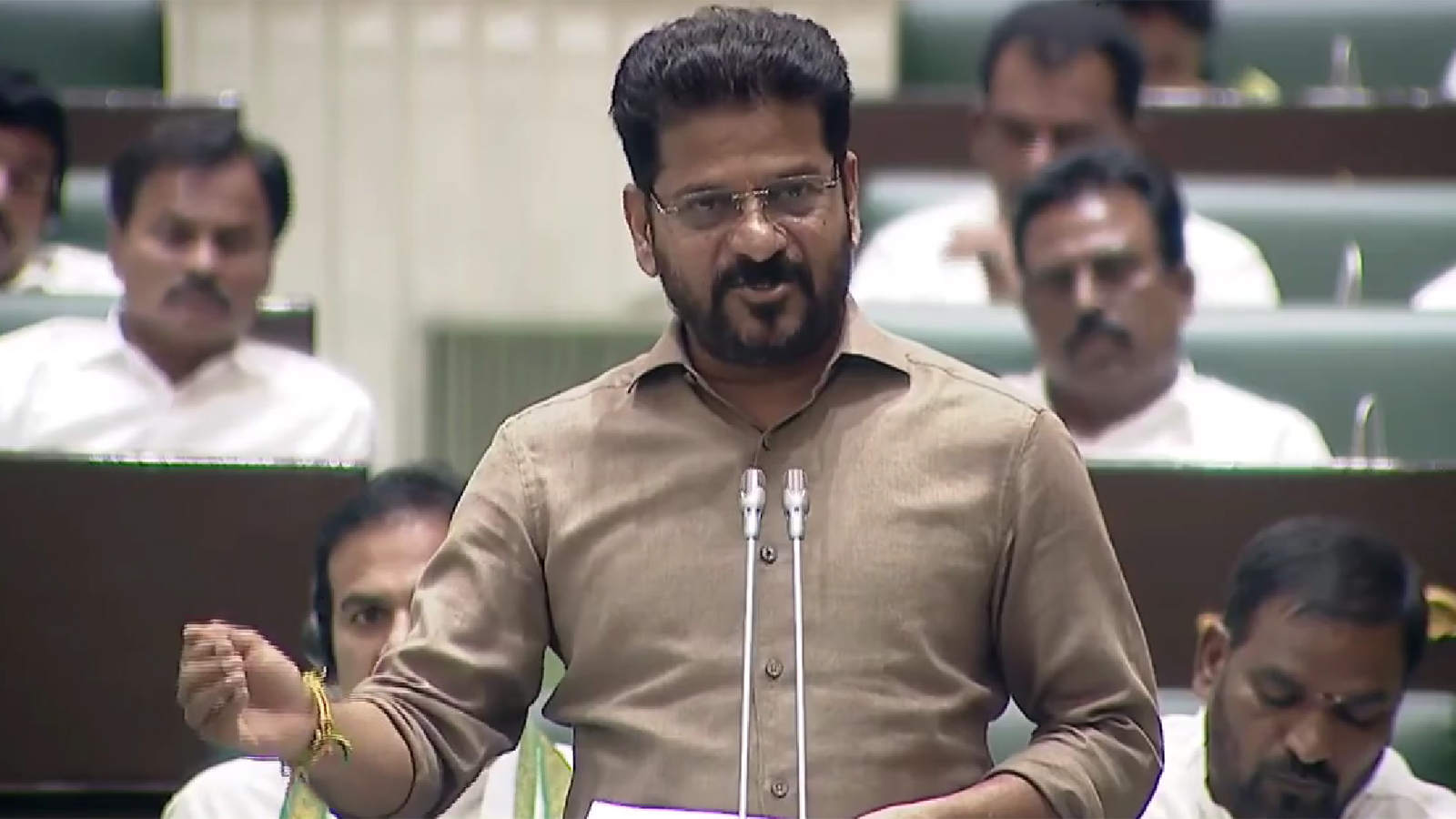Revanth Reddy and Harish Rao land row