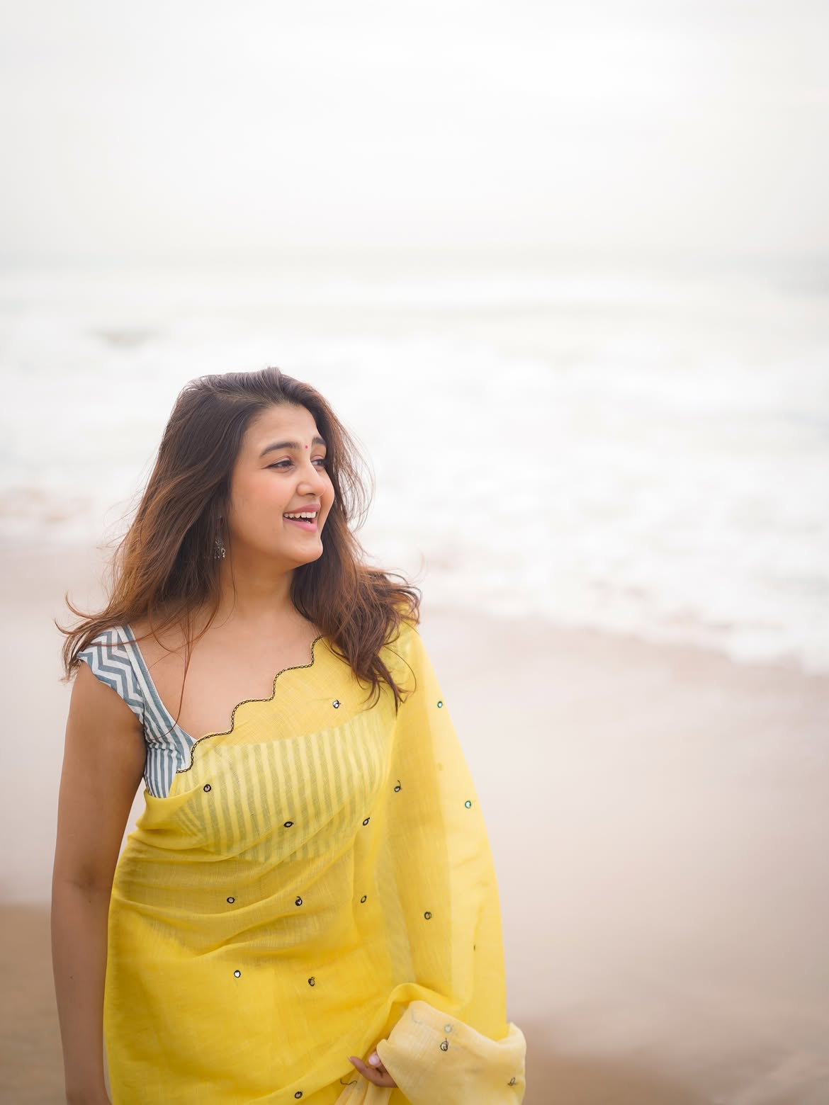 Sowmika Looking Gorgeous In Yellow Beach Fashion
